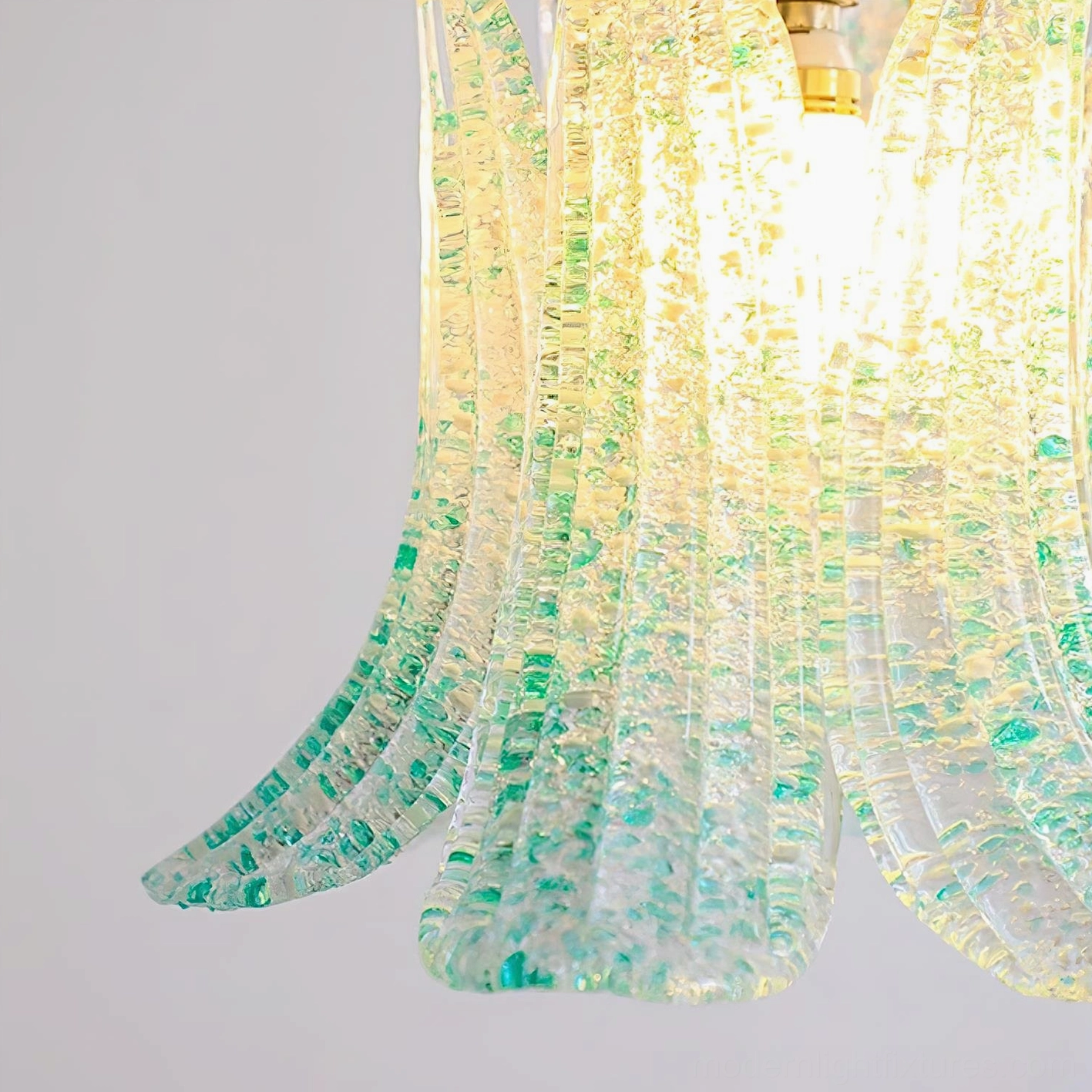 Artisan Murano glass lily pendant lamp showing fluid petal-inspired silhouette and light refraction through glass