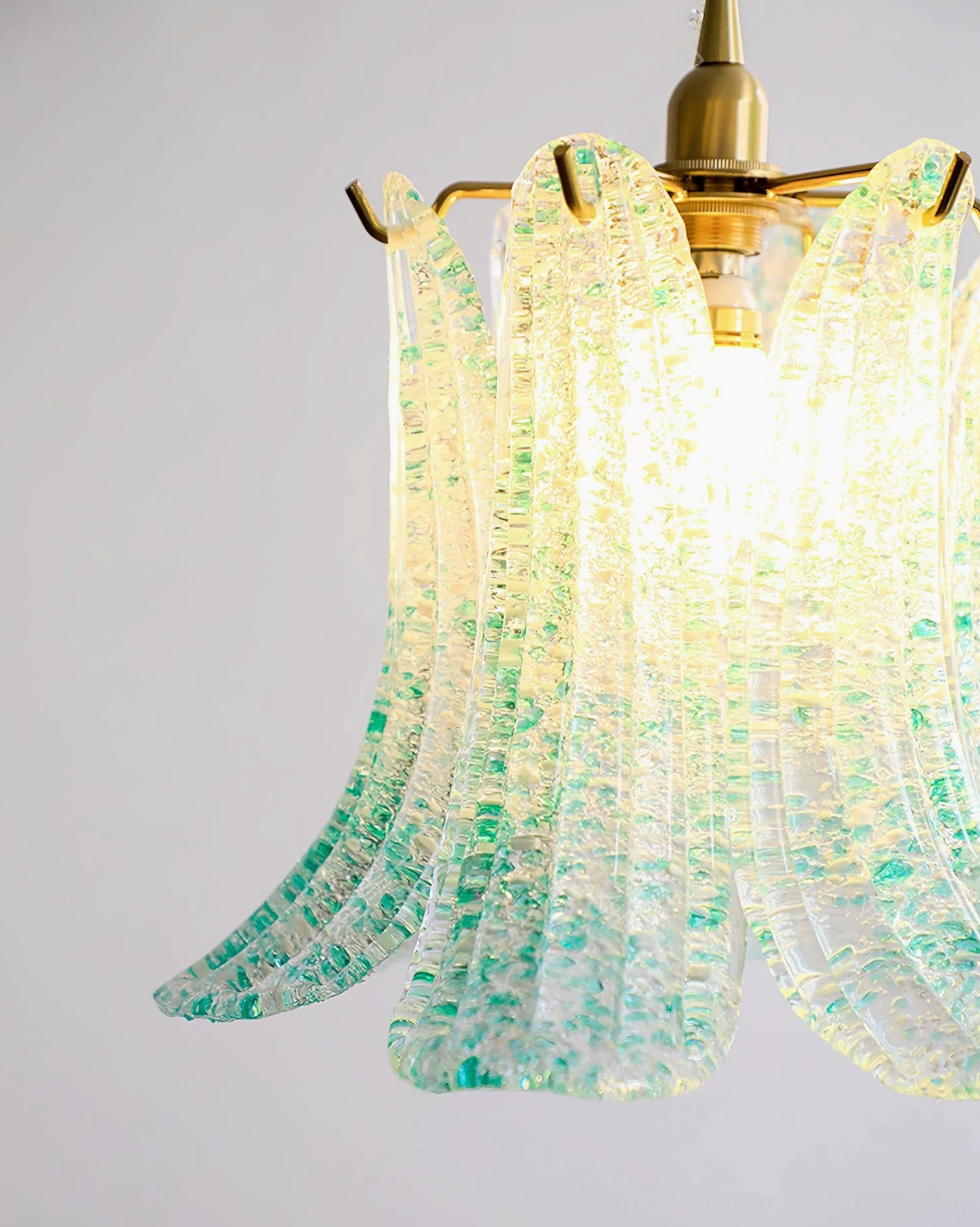 Murano glass pendant light in contemporary dining room setting, demonstrating ambient lighting above table