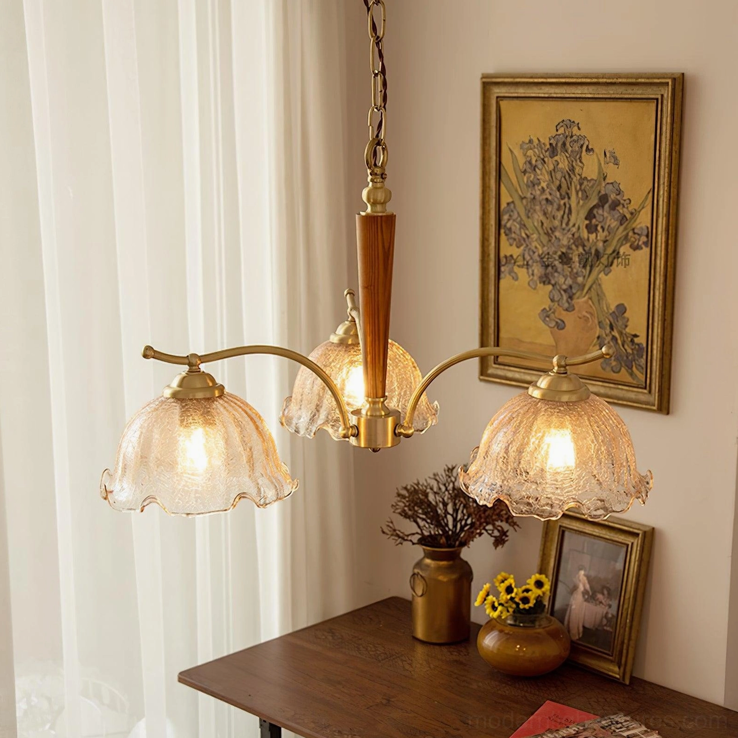 4-head vintage Murano chandelier with ruffled amber glass shades in warm retro home desk scene