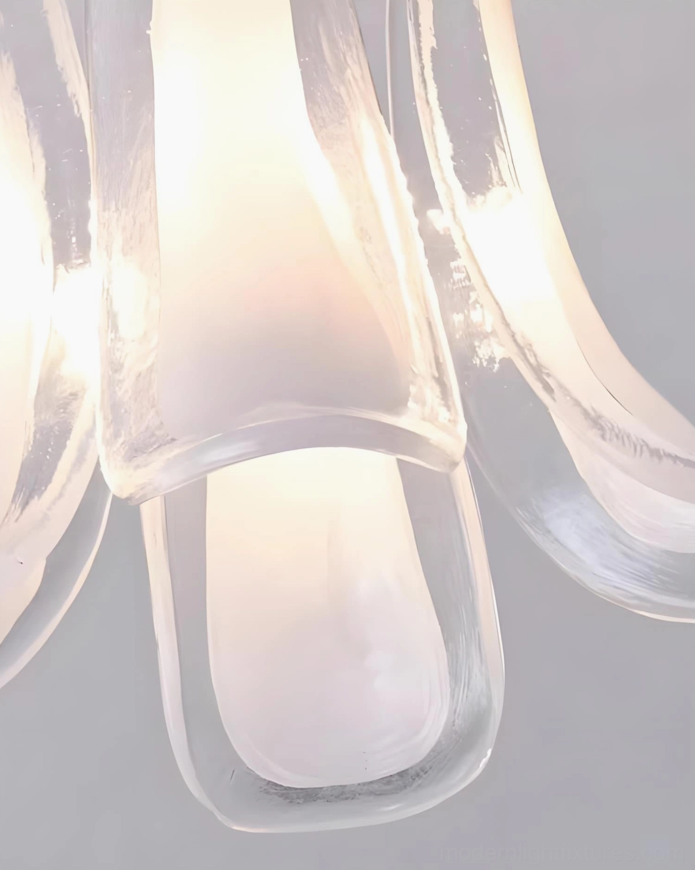 Murava glass petal pendant light installed in high-ceiling modern living space
