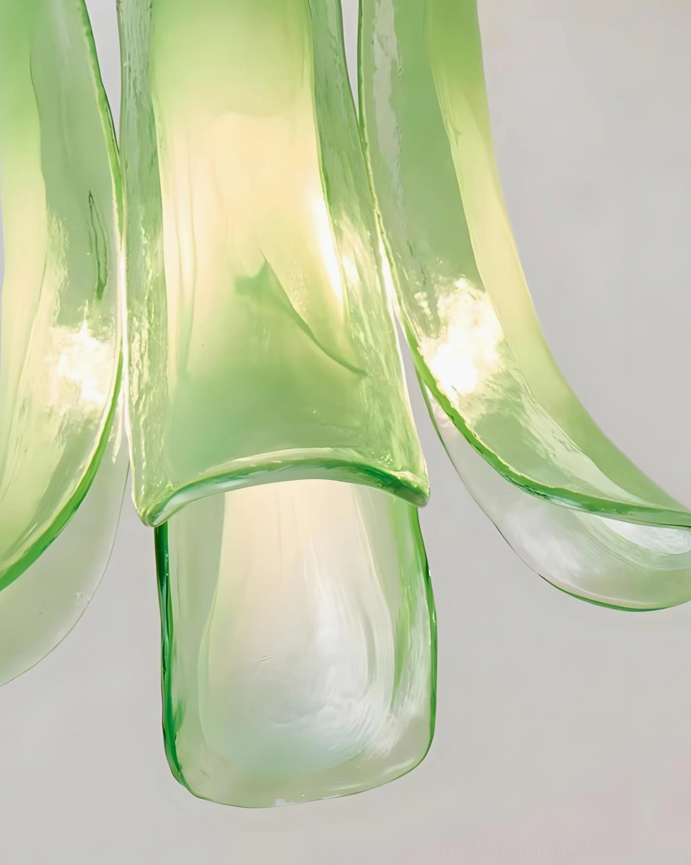 Murava glass petal pendant light with LED bulb showing warm white color temperature