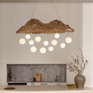 Modern organic pendant chandelier with brown wood-textured top and multiple frosted glass hanging bulbs in contemporary kitchen dining space
