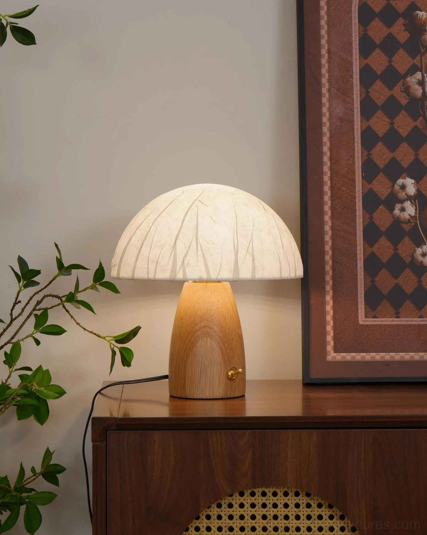 Contemporary mushroom dome lamp with light wood grain base and soft warm glow
