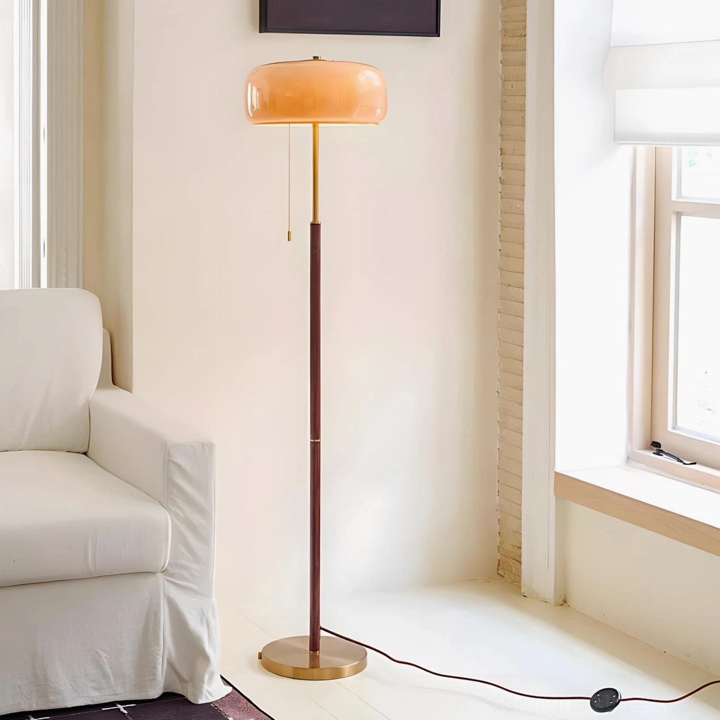 Mushroom floor lamp with gradient powder finish, brass base, and walnut wood stem in home setting