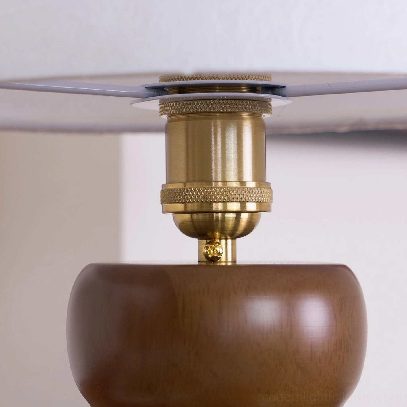 Dimmer compatible mushroom table lamp providing customizable warm light in modern home office space