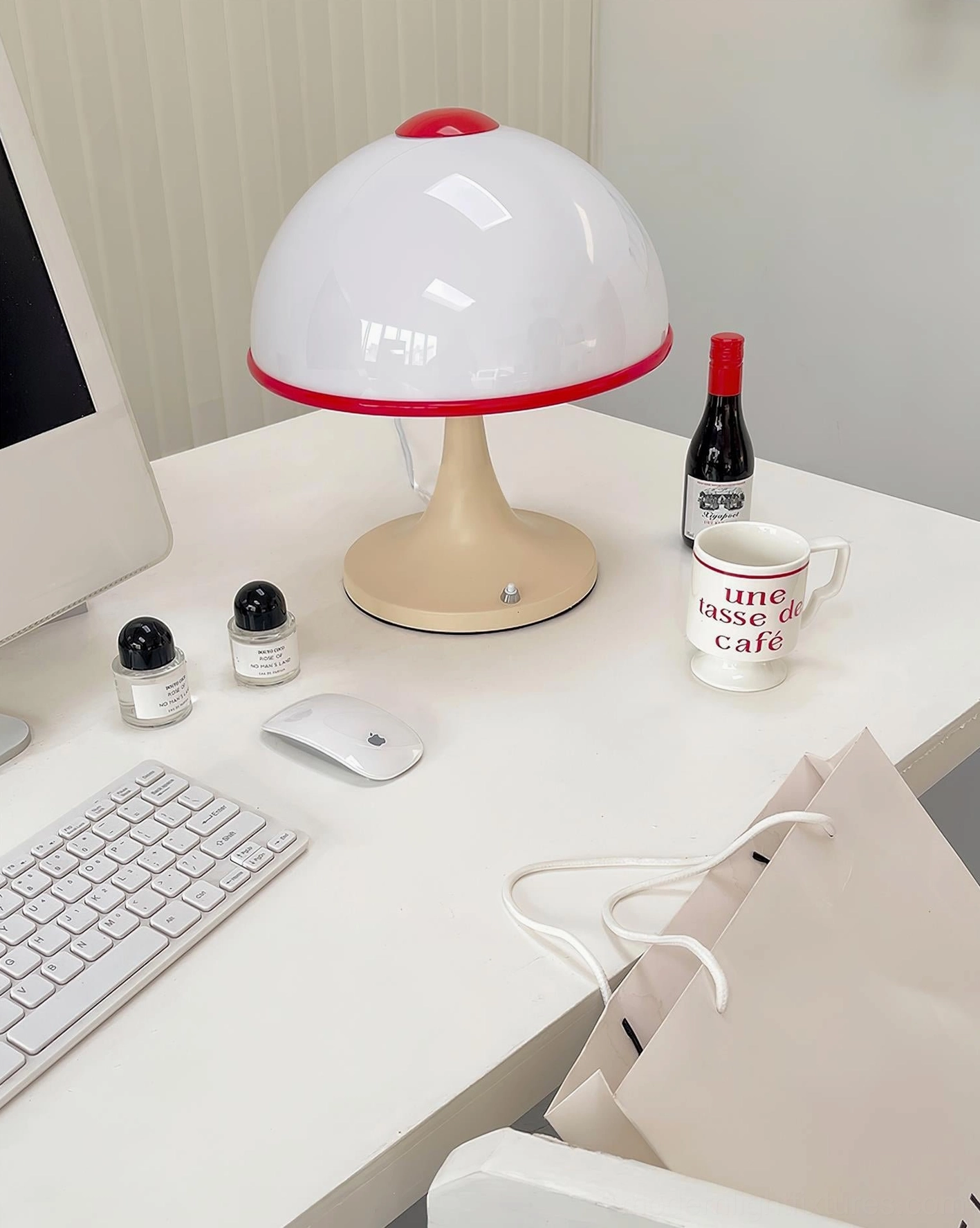 Julie mushroom table lamp home office desk three-quarter view with keyboard and modern workspace setup
