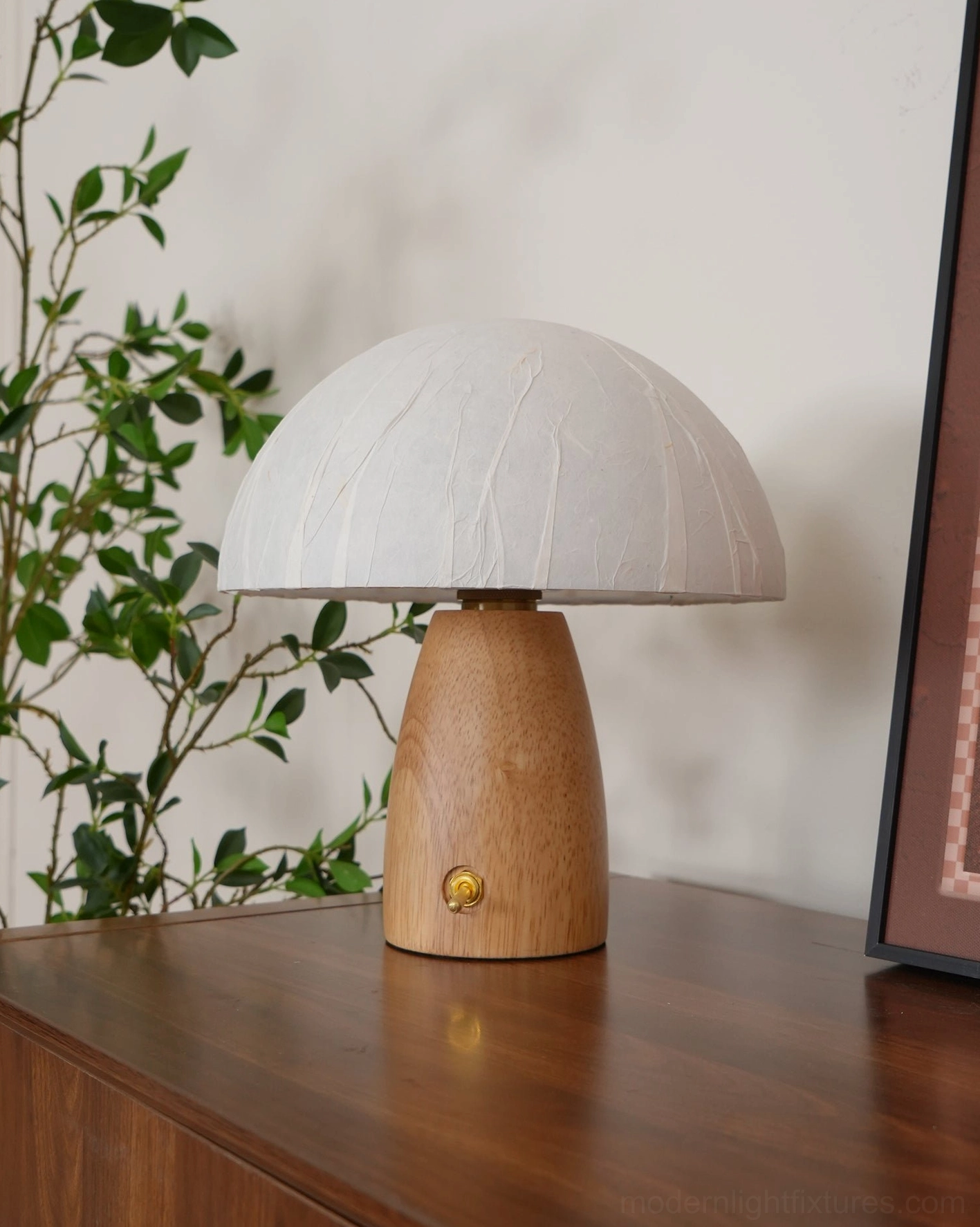 Contemporary mushroom table lamp variant in light wood with decorative interior scene