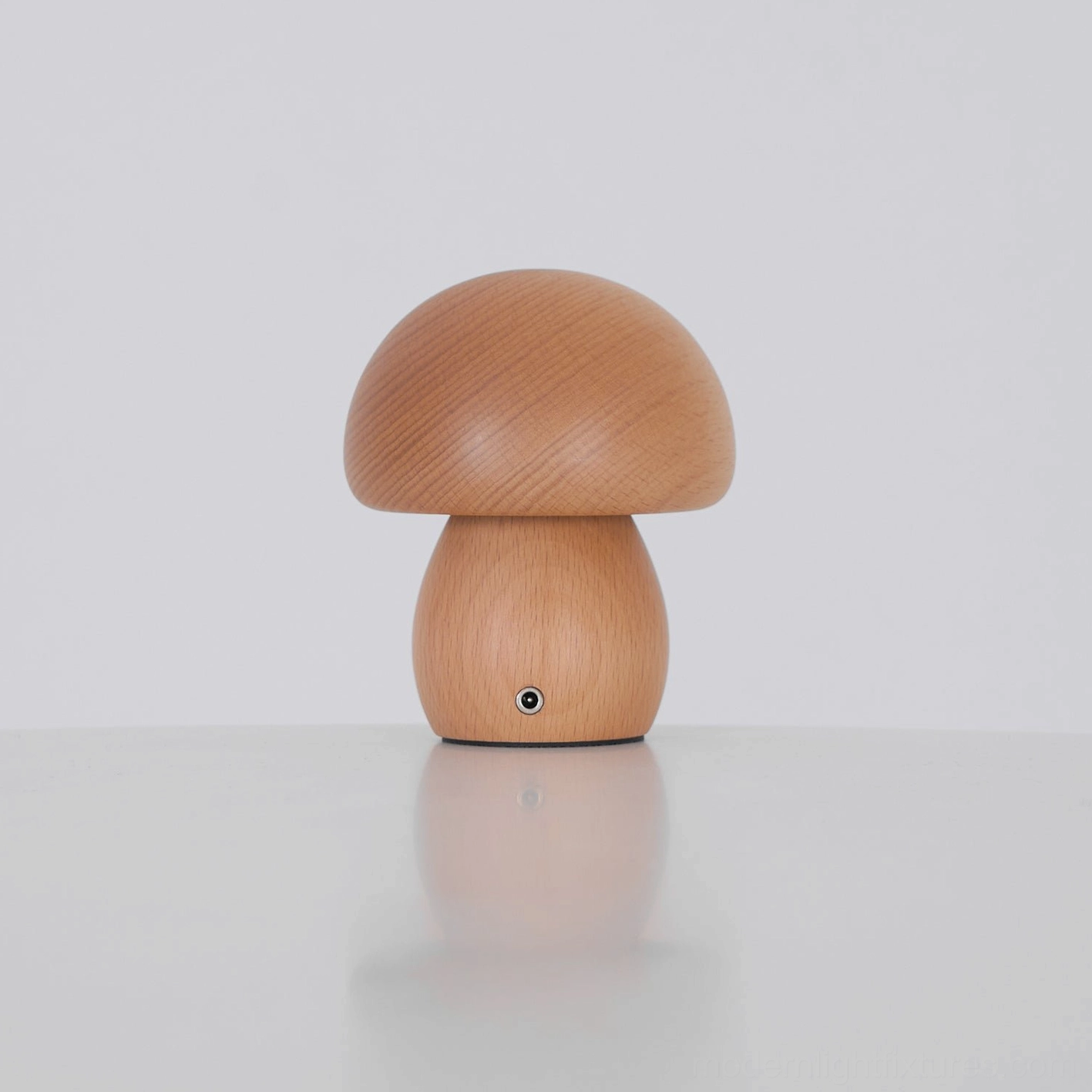 Mushroom table lamp living room styling beside mirror and artwork showing gallery wall coordination