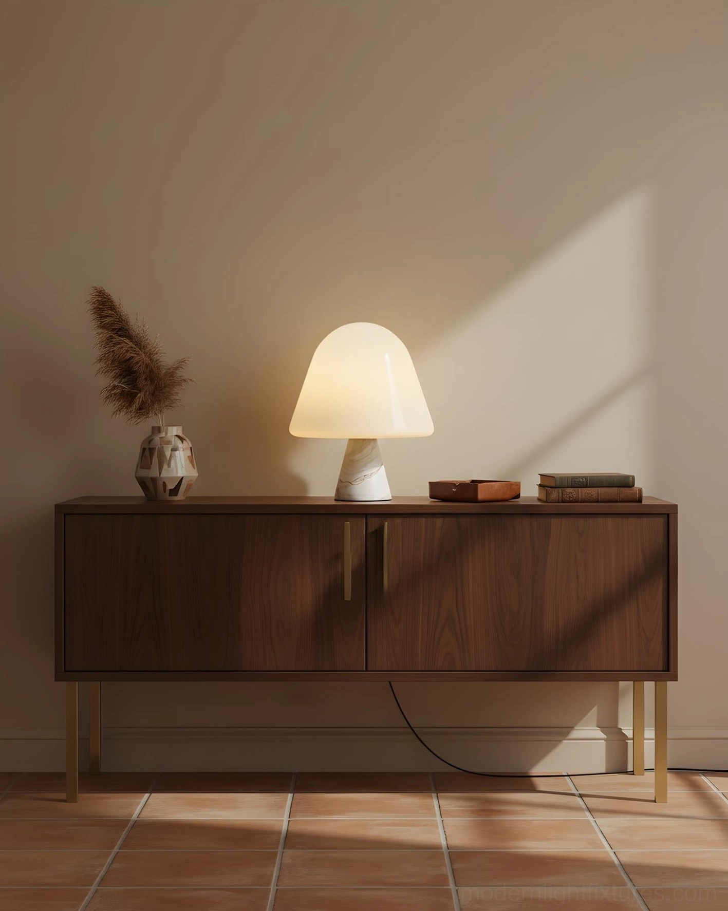 Warm-toned mushroom table lamp on dark wood sideboard in lounge space with dried floral decor and soft ambient light diffusion