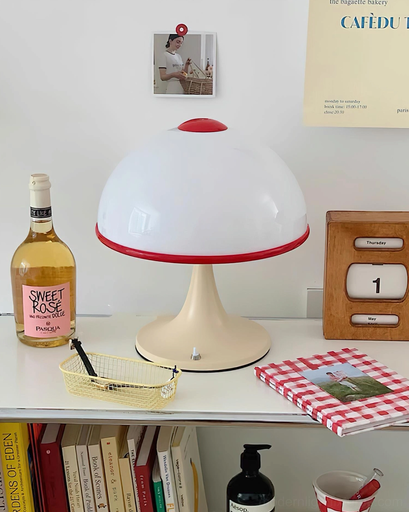 Mid-century mushroom table lamp three-quarter view indoor styling with decorative accessories