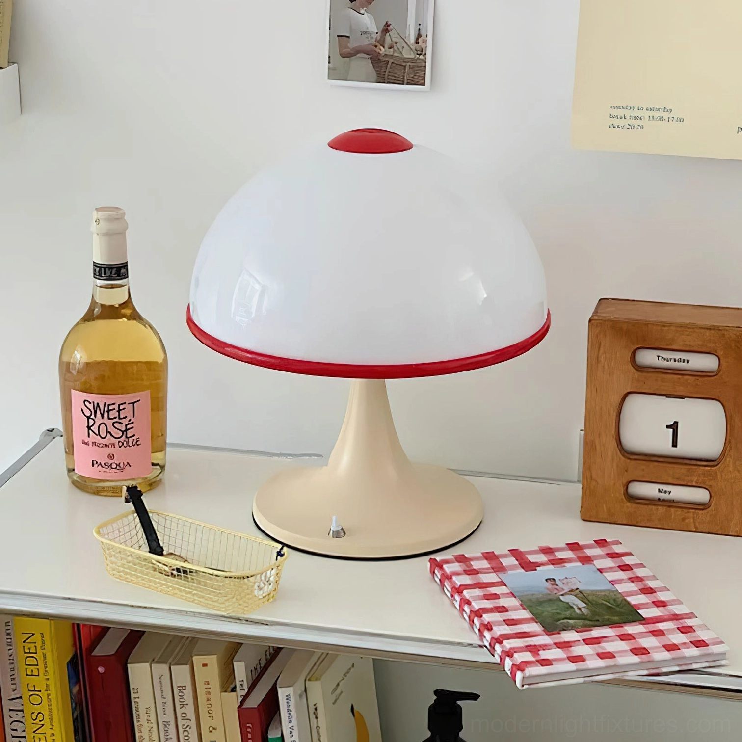 Mid-century modern mushroom table lamp three-quarter view on indoor side table with wine glass and notebook styling