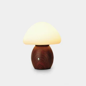 Modern mushroom table lamp with frosted white resin shade and walnut wood base, direct front view on white background