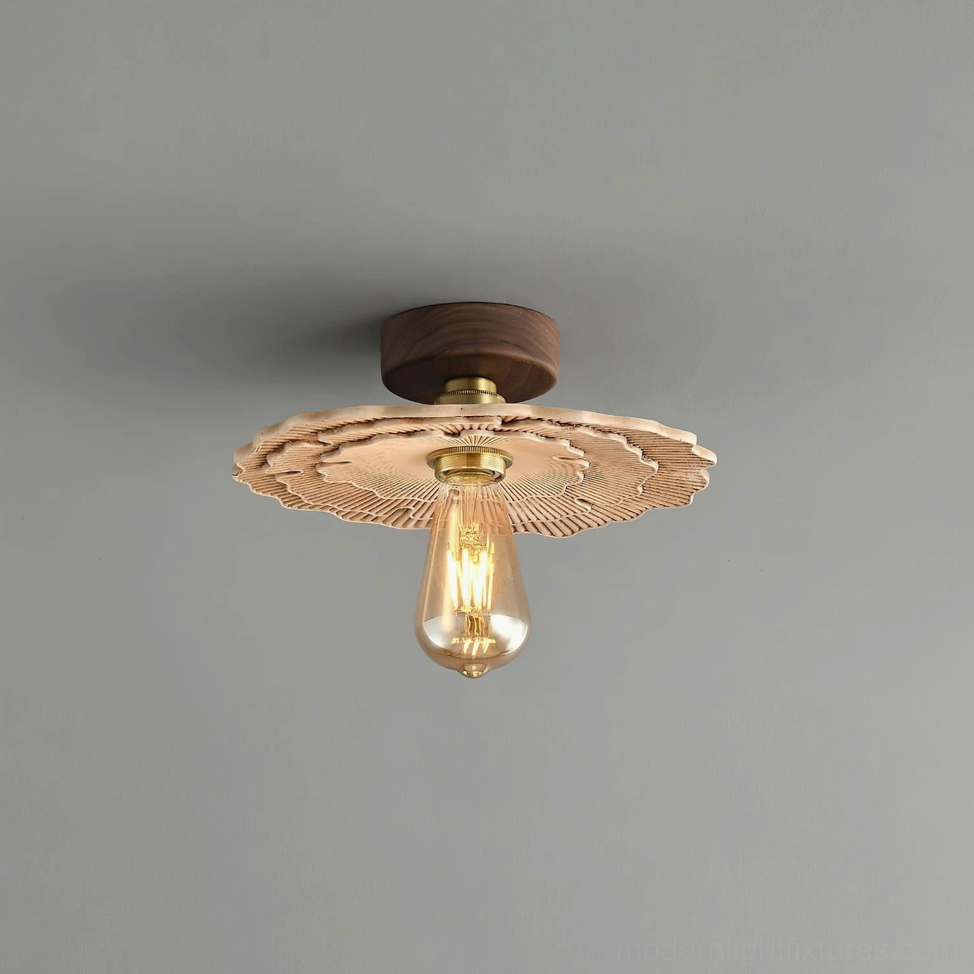 Complete Myco mushroom-inspired ceiling light fixture close-up, front oblique view against gray studio background