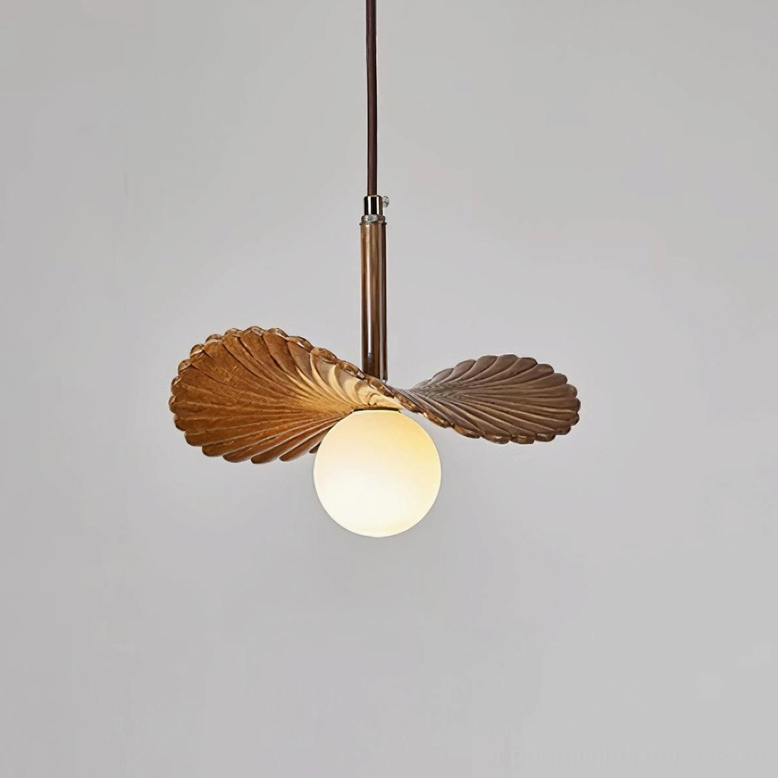 Brown wood-tone Myrna pendant lamp with fluted shade and bronze metal rod, studio backdrop highlighting warm color finish