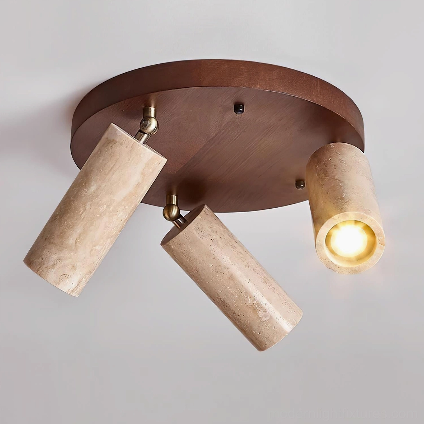 3-head travertine and wood adjustable ceiling light showing individual head articulation and warm lighting effect