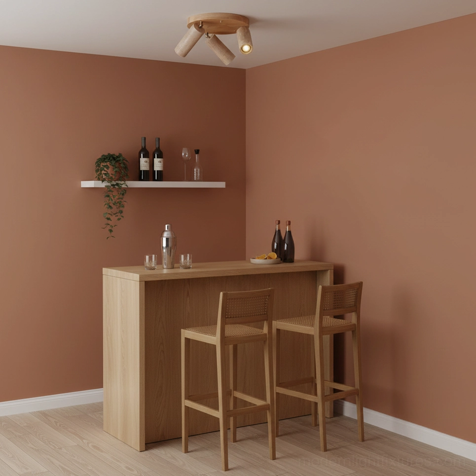 Adjustable travertine ceiling light fixture in residential bar dining nook with terracotta accent wall, warm minimalist decor
