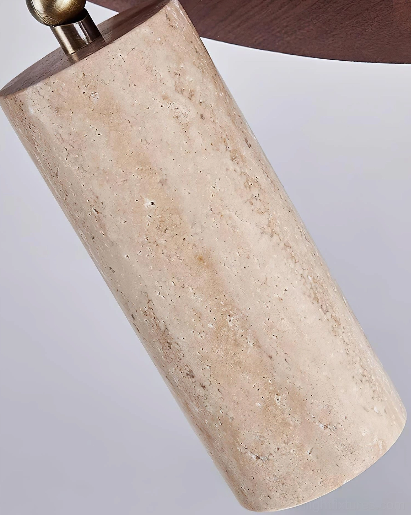 Myrtle travertine ceiling light fixture highlighting organic stone texture and minimalist wood canopy in studio lighting
