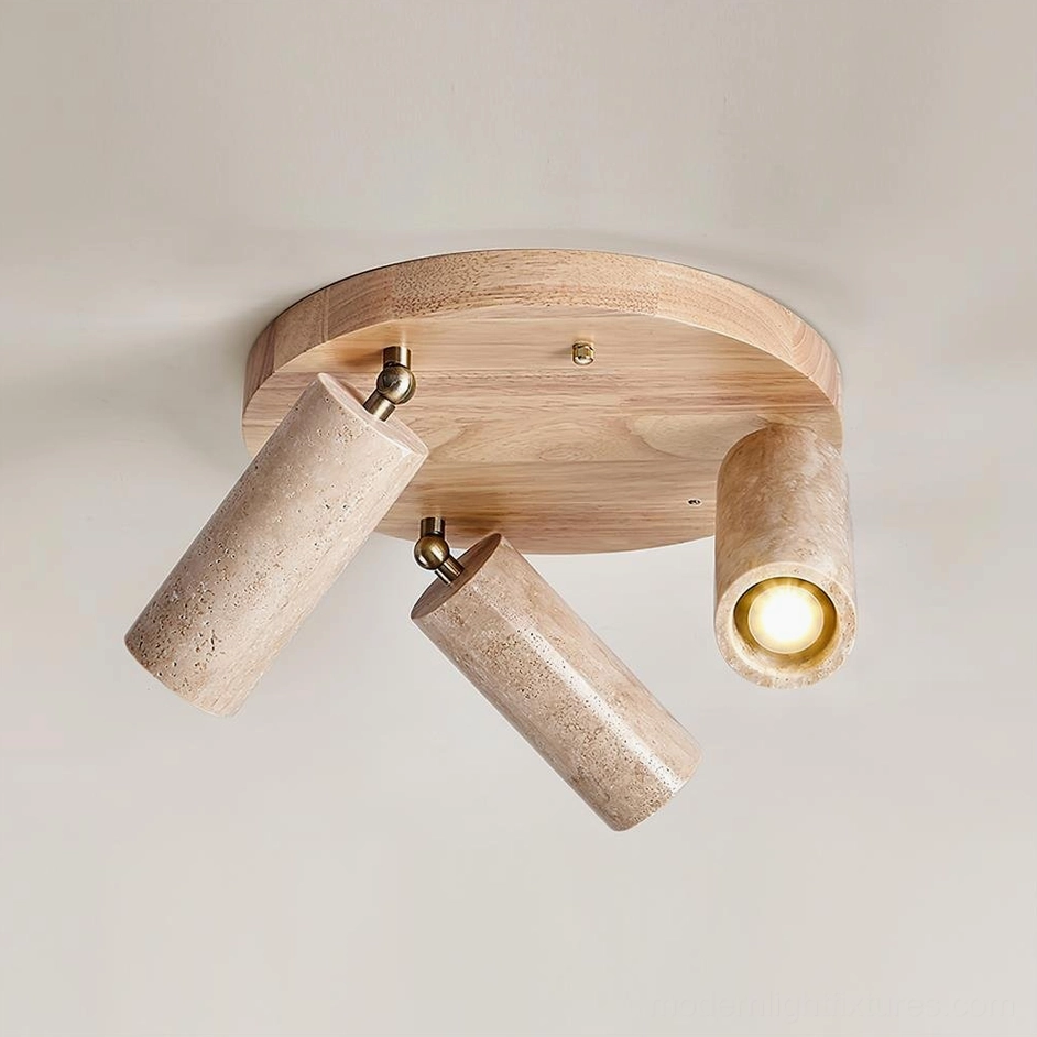 Wood color travertine ceiling light with light natural wooden canopy and brass accents, overhead flat studio view