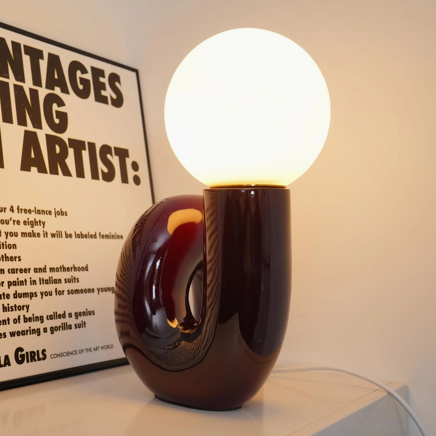 N-shape table lamp detail showing cord management and push-button switch placement on wire