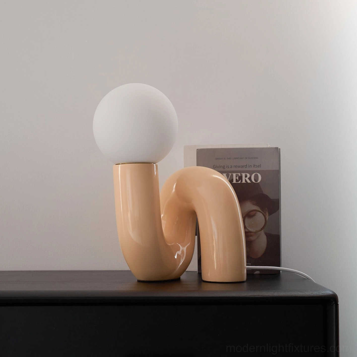 N-shape glass table lamp with G9 socket bulb compatibility feature highlighted in detail