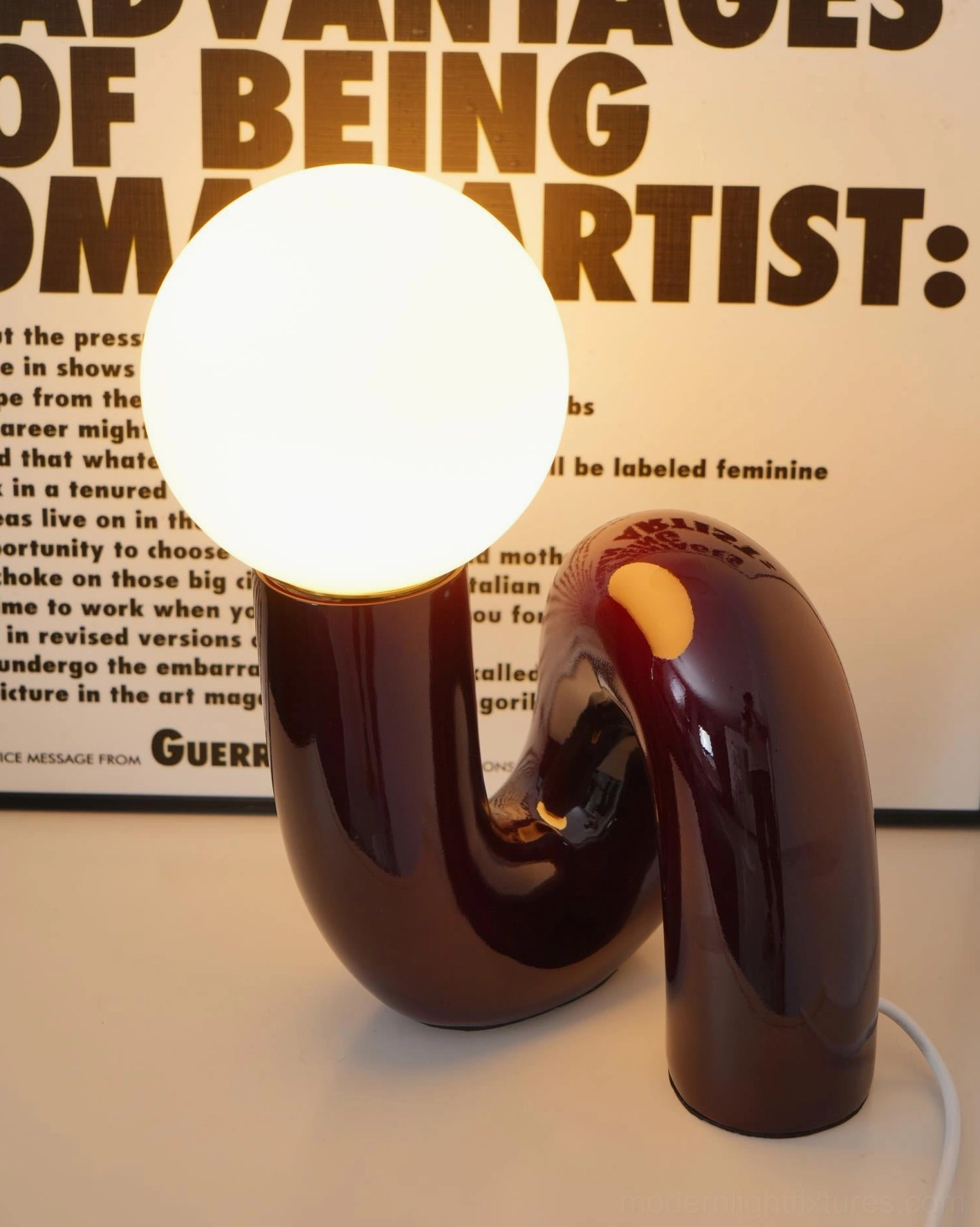 N-shape modern table lamp overhead view showing circular base diameter and shade configuration