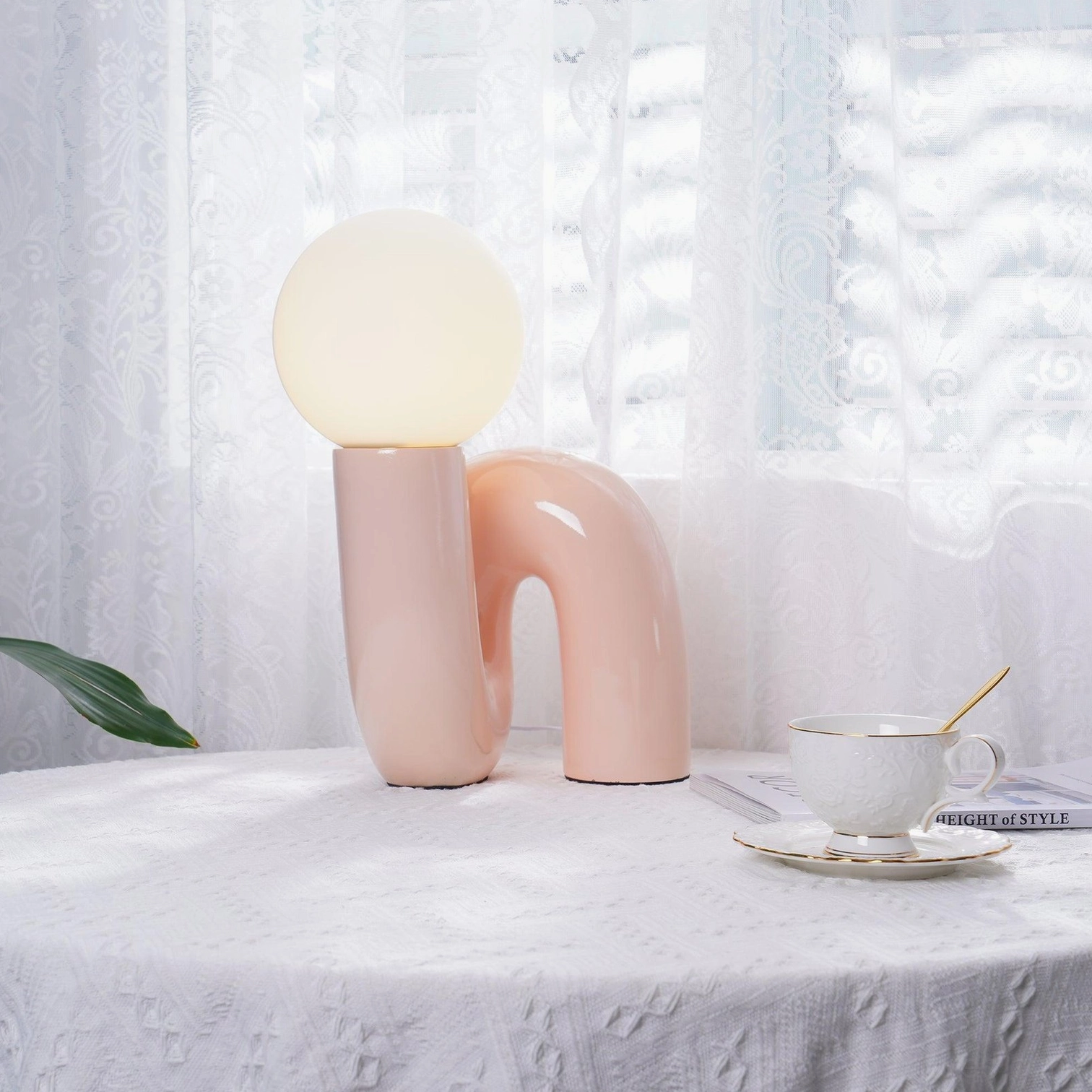 N-shape modern table lamp dark red variant showcasing rich color ceramic base and glass shade