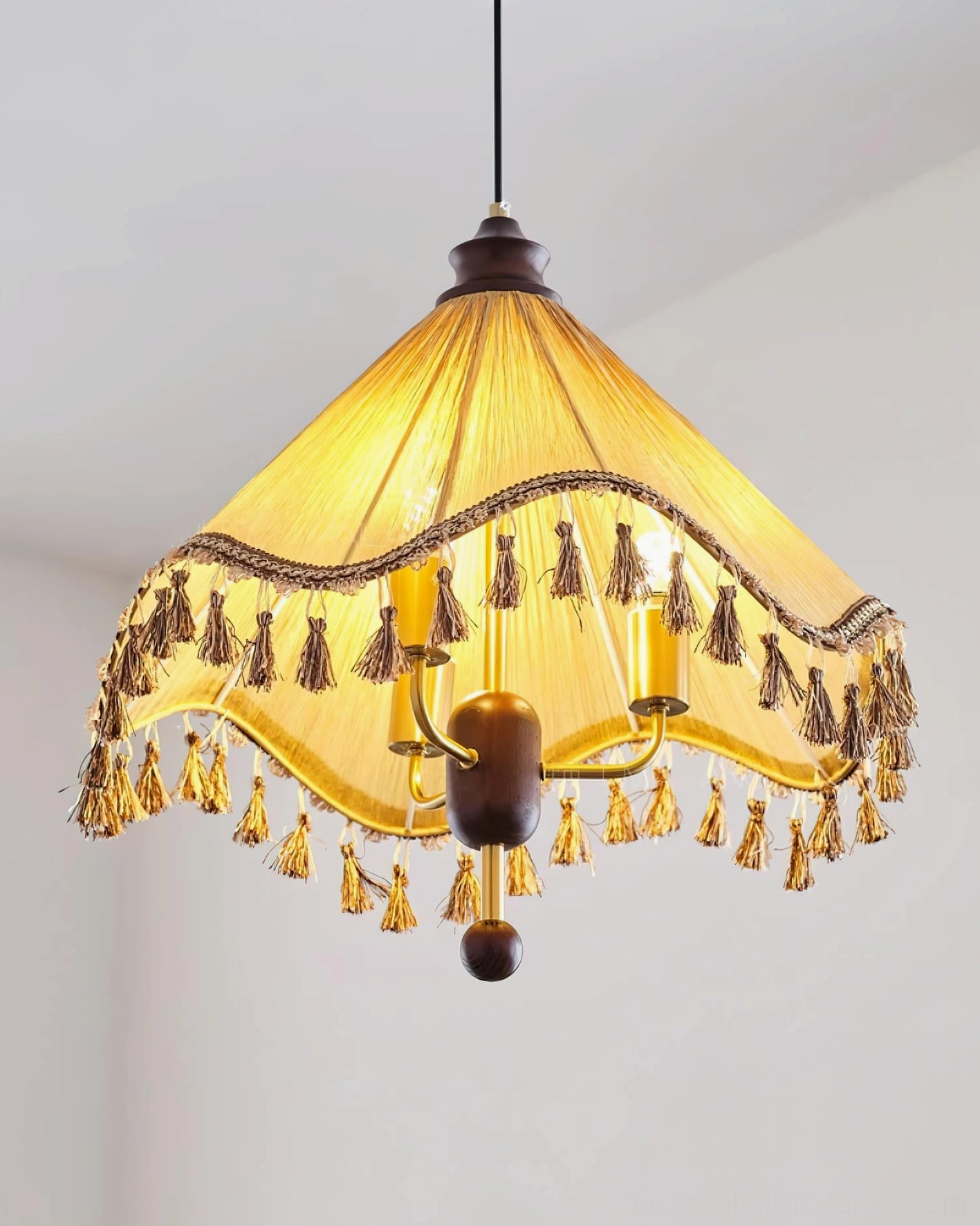 Nadia bohemian pendant lamp with three E26 E27 sockets and detailed tassel fringe trim, low three-quarter front view showing fixture structure