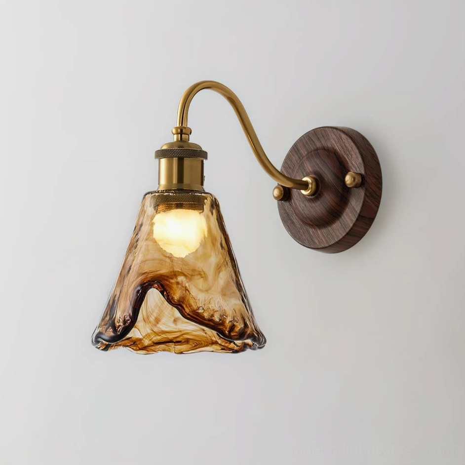 Nalia amber wall sconce primary product image showing full fixture with warm glass shade and metal body