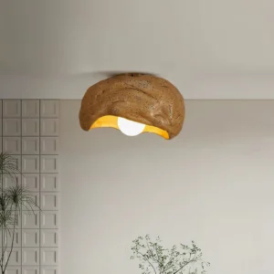 Nami ceiling light installed in modern minimalist living room with wabi-sabi aesthetic and brown ceramic dome