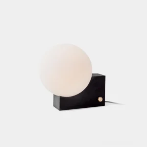 Natalia frosted globe table lamp with black metal base, front studio view on white background
