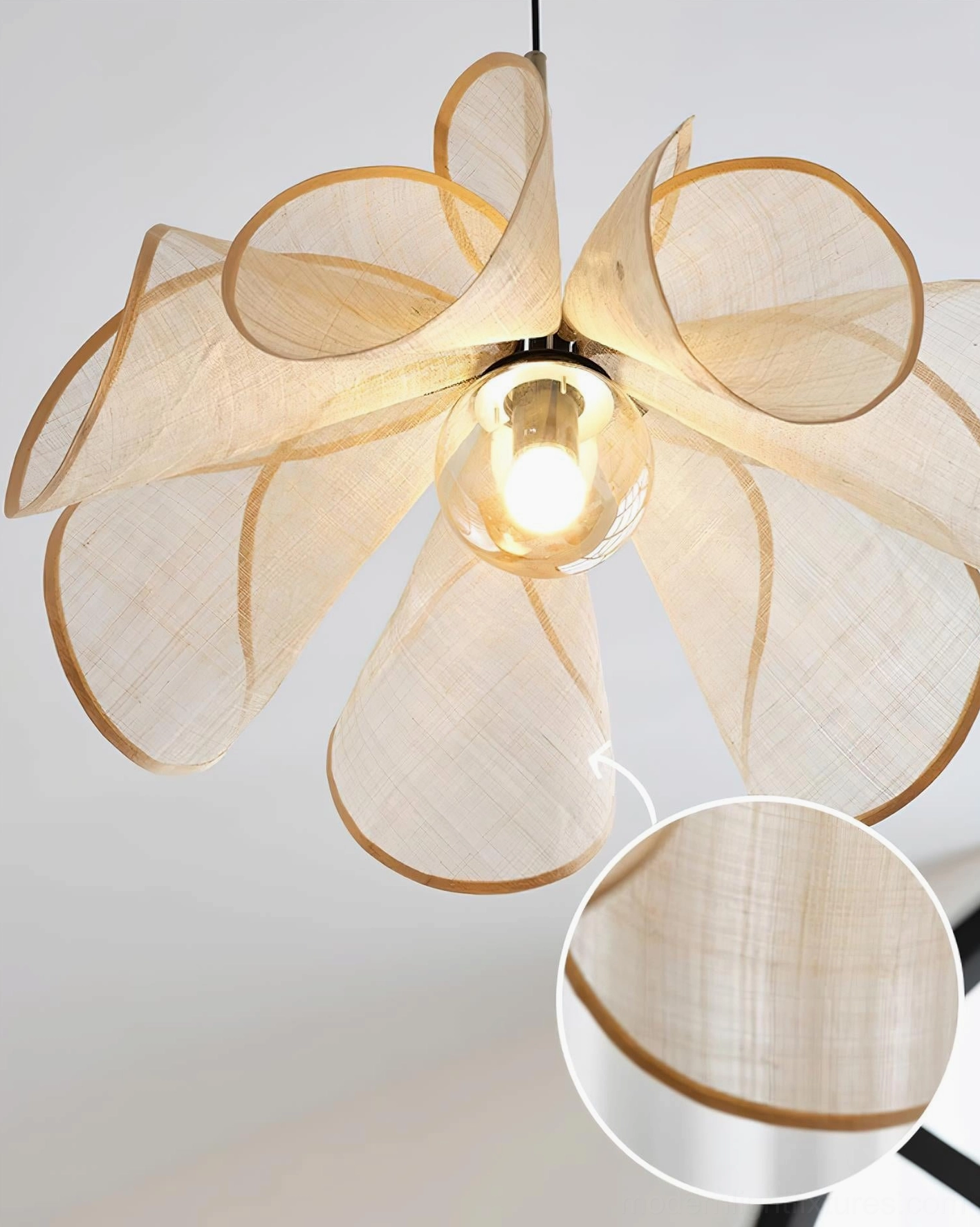 Extreme close-up of Styria Petals jute fabric texture detail showing natural fiber weave and exposed glass light bulb