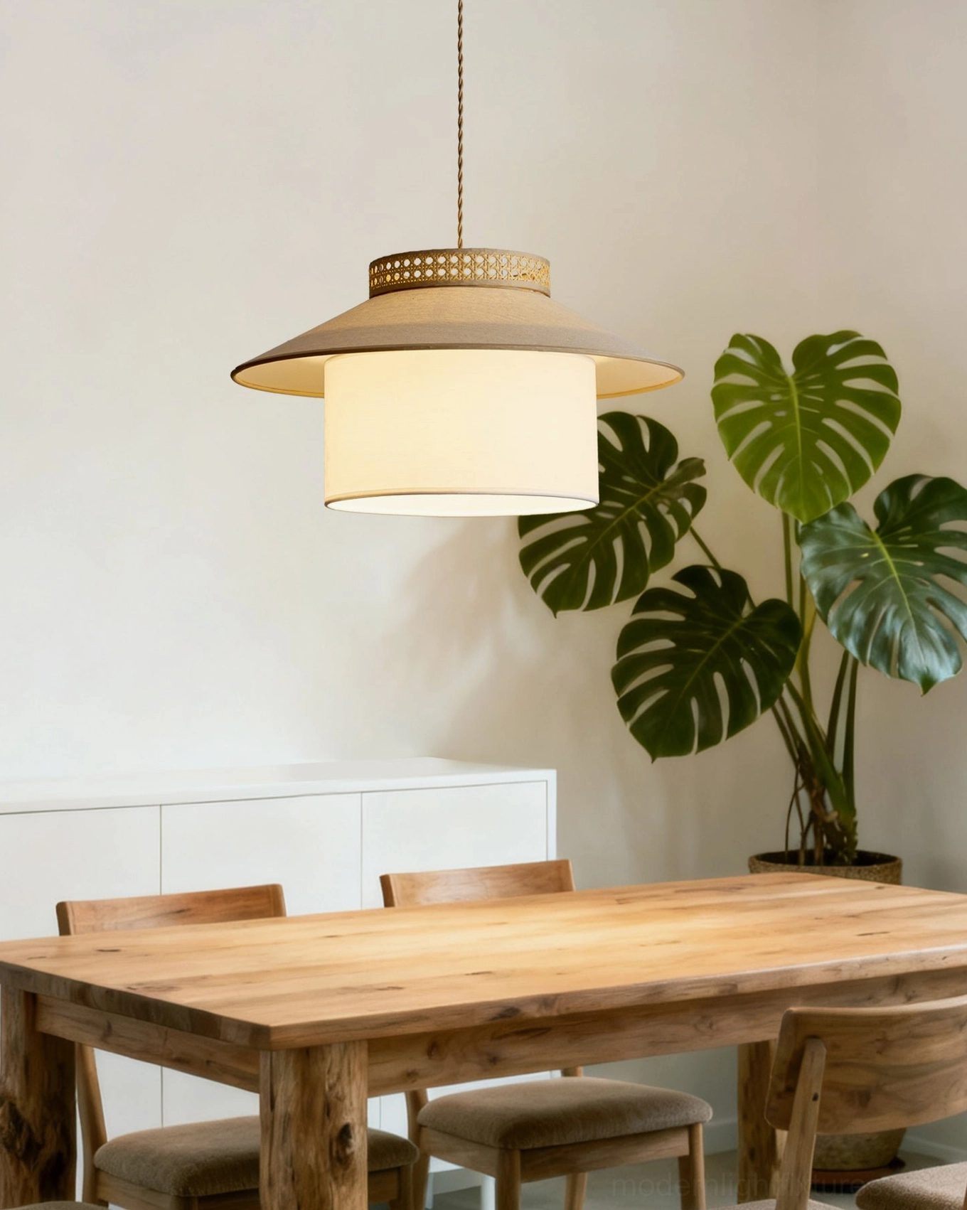 Natural rattan pendant light with white fabric showing warm ambient glow, boho farmhouse hanging lamp design
