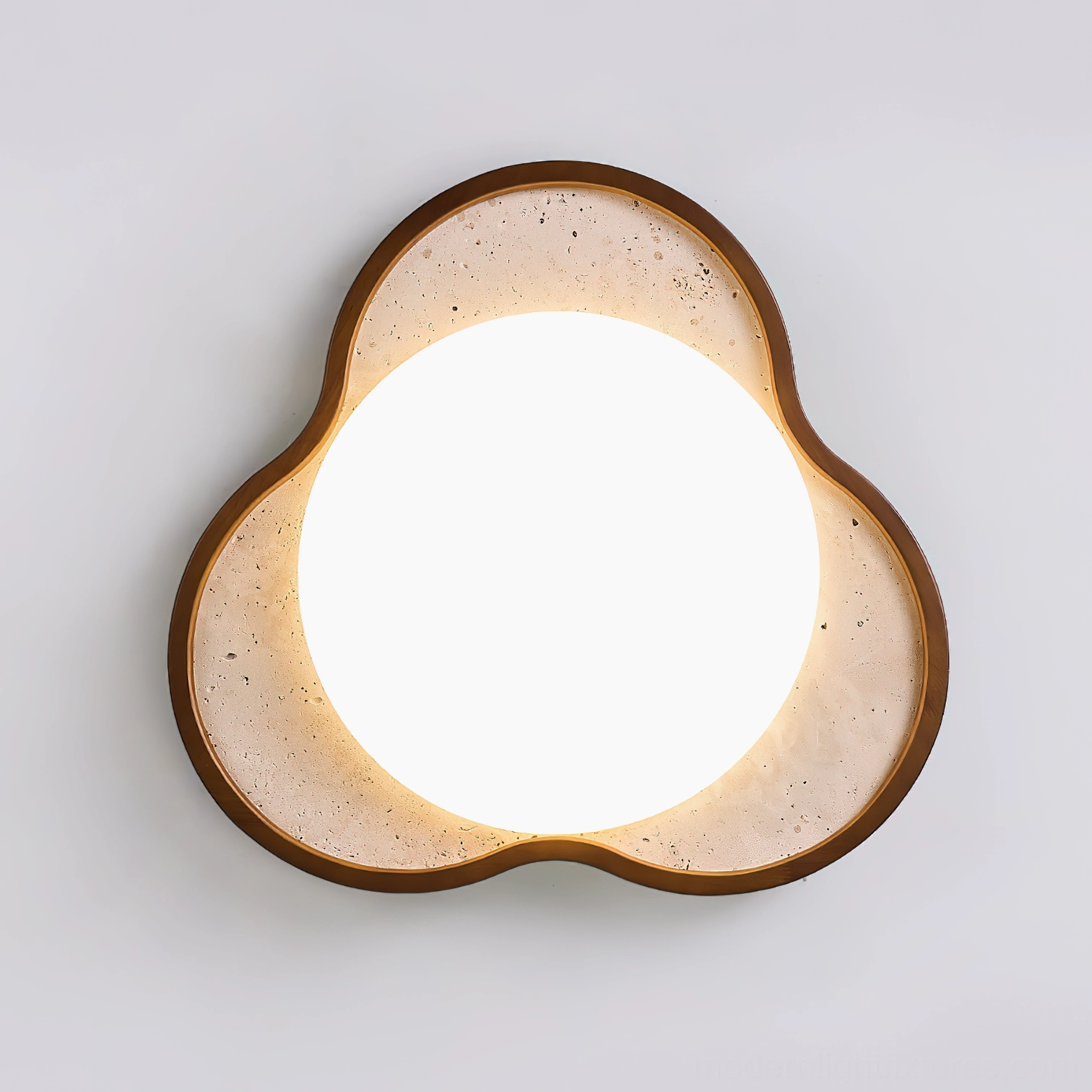 Natural travertine stone ceiling light emphasizing organic material authenticity