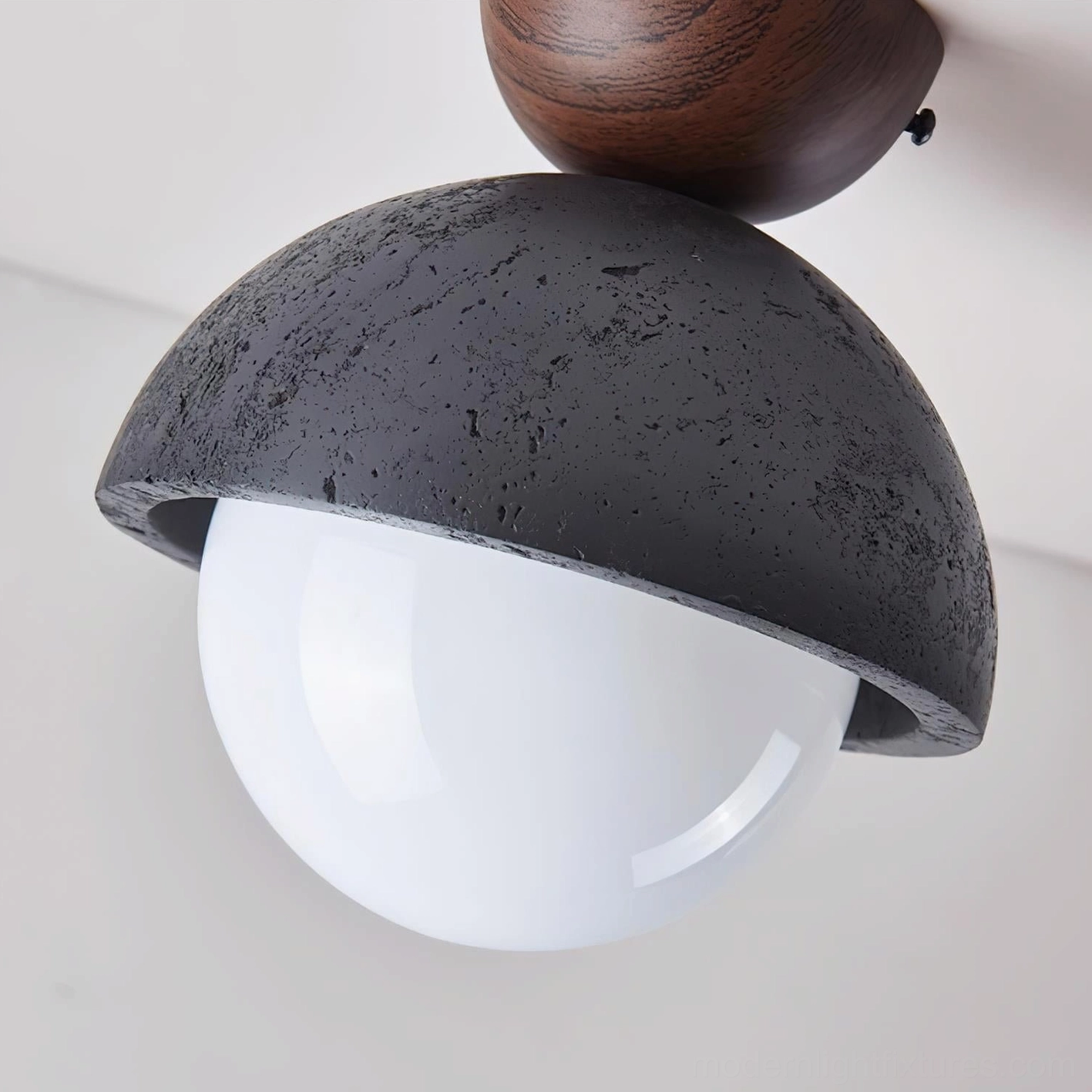 Natural travertine dome ceiling light with warm wood accent detailing