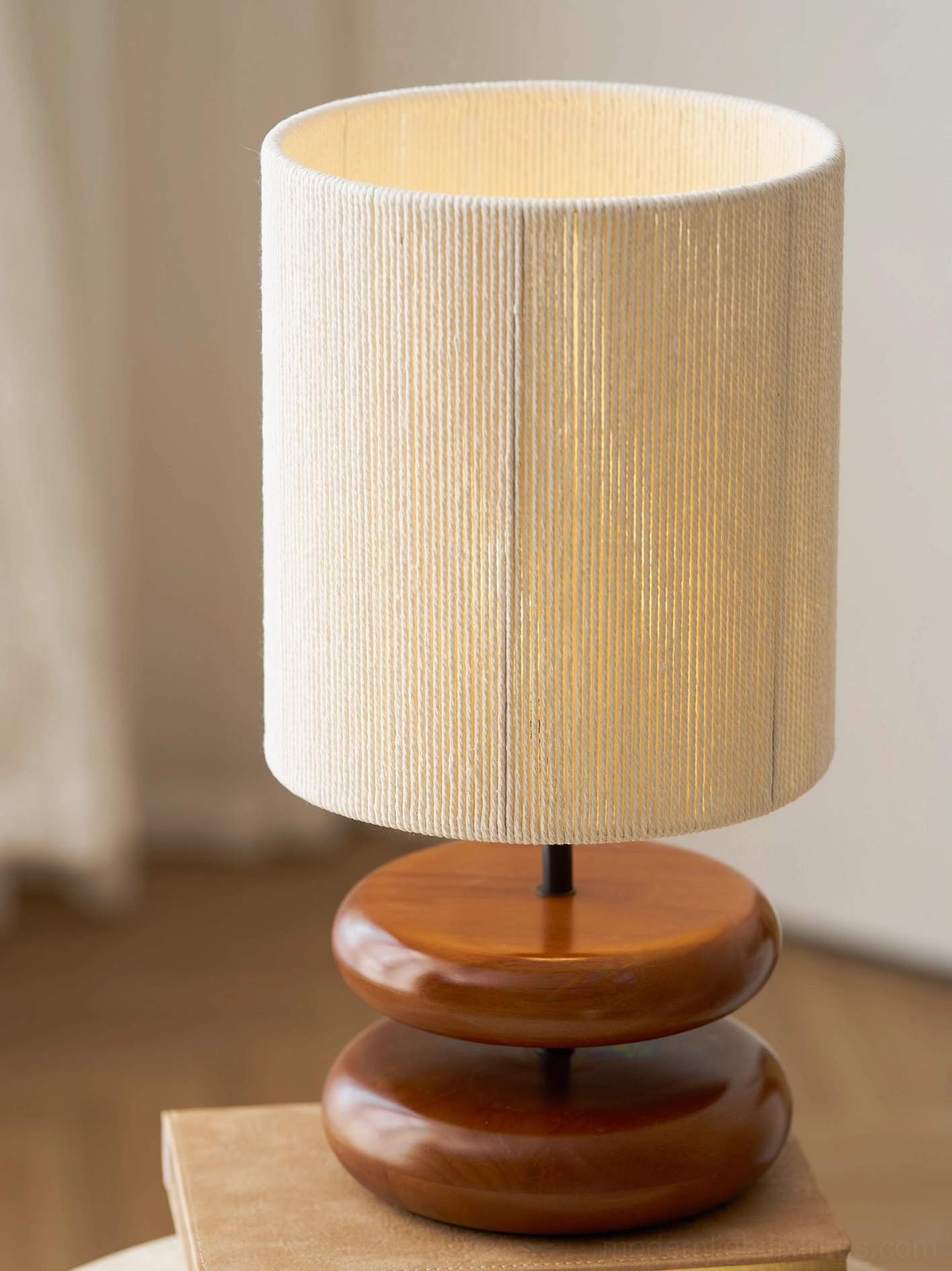 Natural wood table lamp with organic modernist stacked base design element