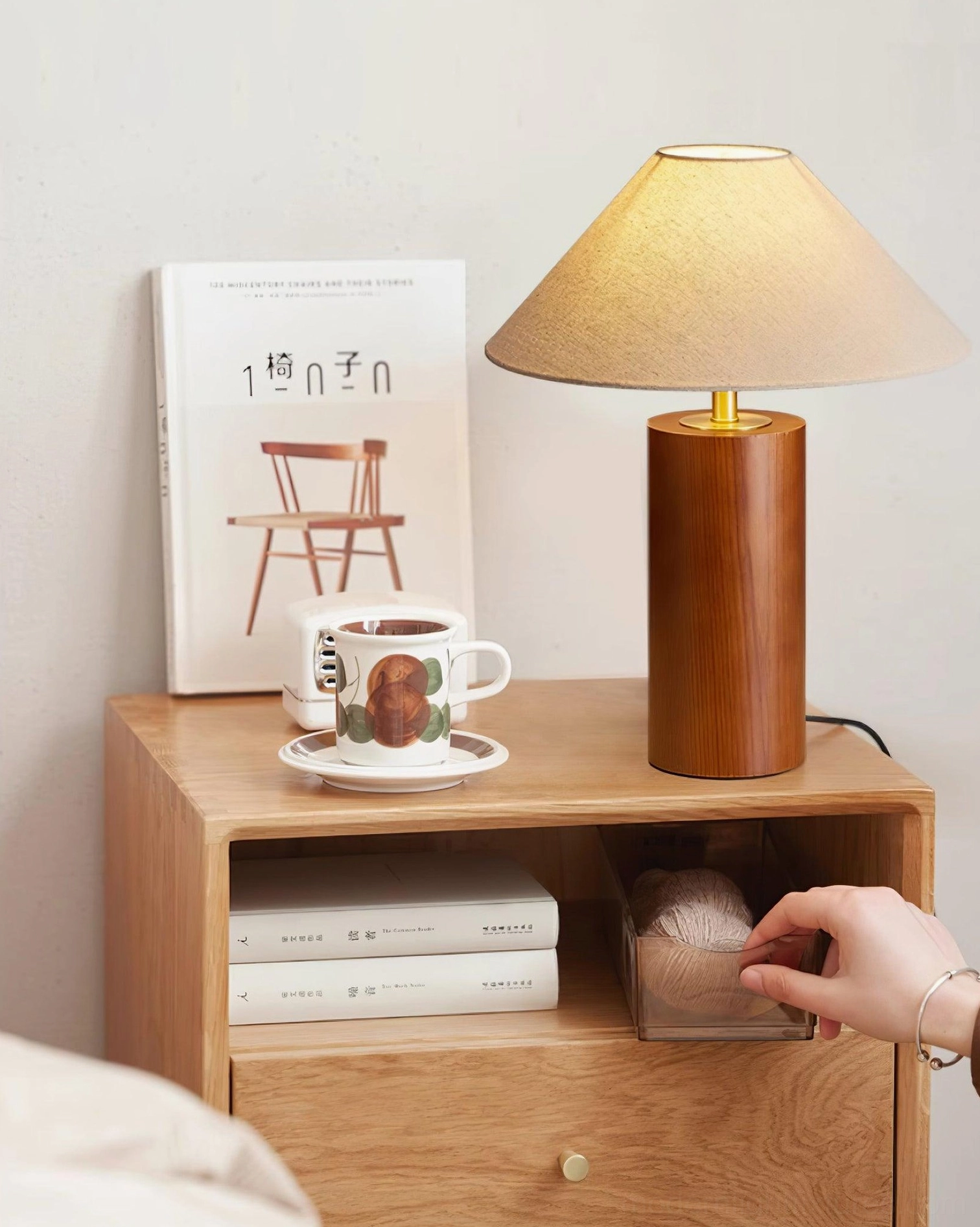 Natural wood table lamp creating warm atmosphere on side table in contemporary interior