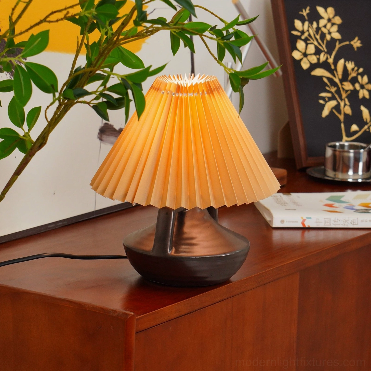 Navia Pleated Ceramic Table Lamp artisanal handcrafted base with neutral cream fabric shade
