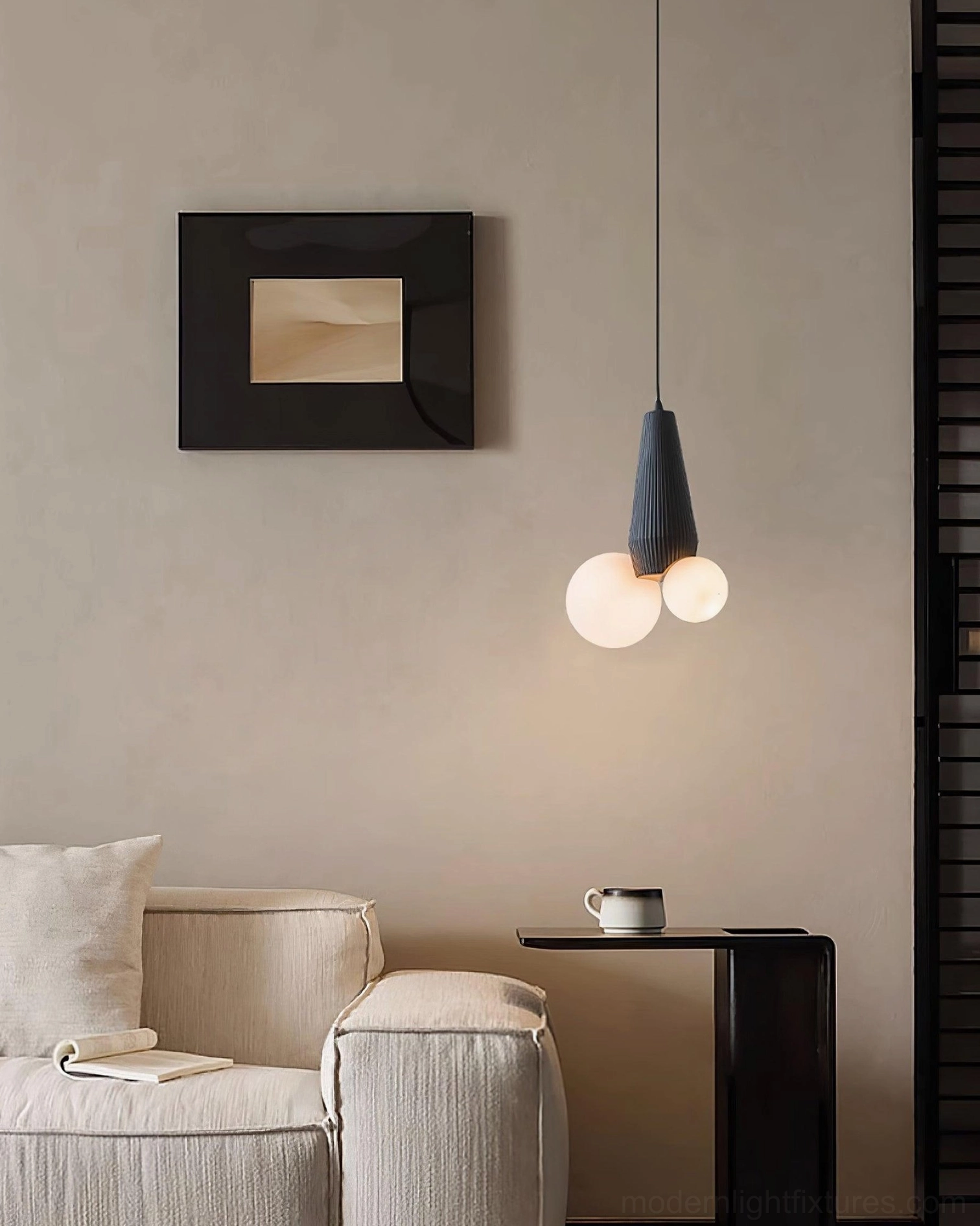 Navy blue modern pendant light with dual identical frosted white glass shades in contemporary living room