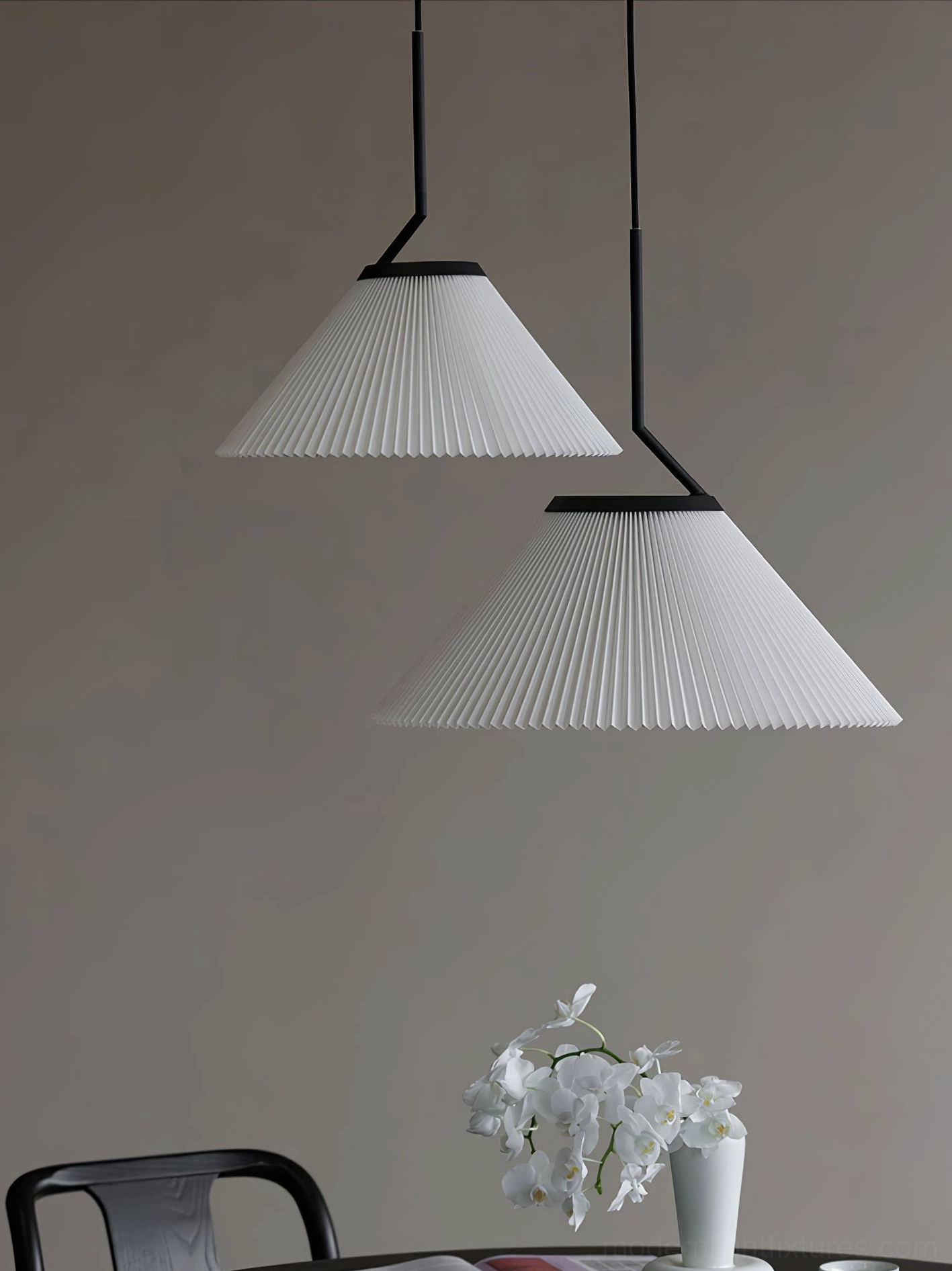 Twin Nebra pleated pendant lights in dining nook - Scandinavian minimalist interior with wooden table
