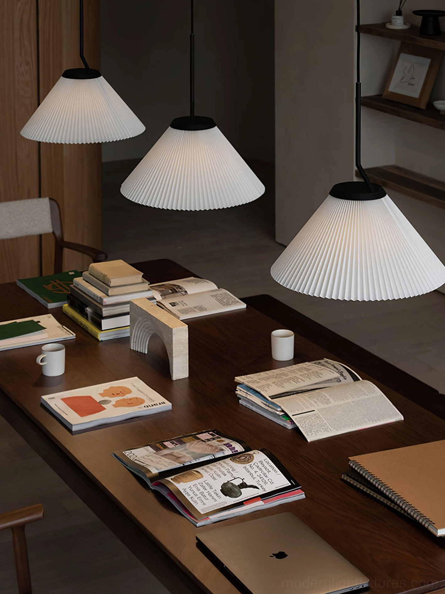 Multiple Nebra pleated pendant lights in home office - minimalist workspace with desk and stationery
