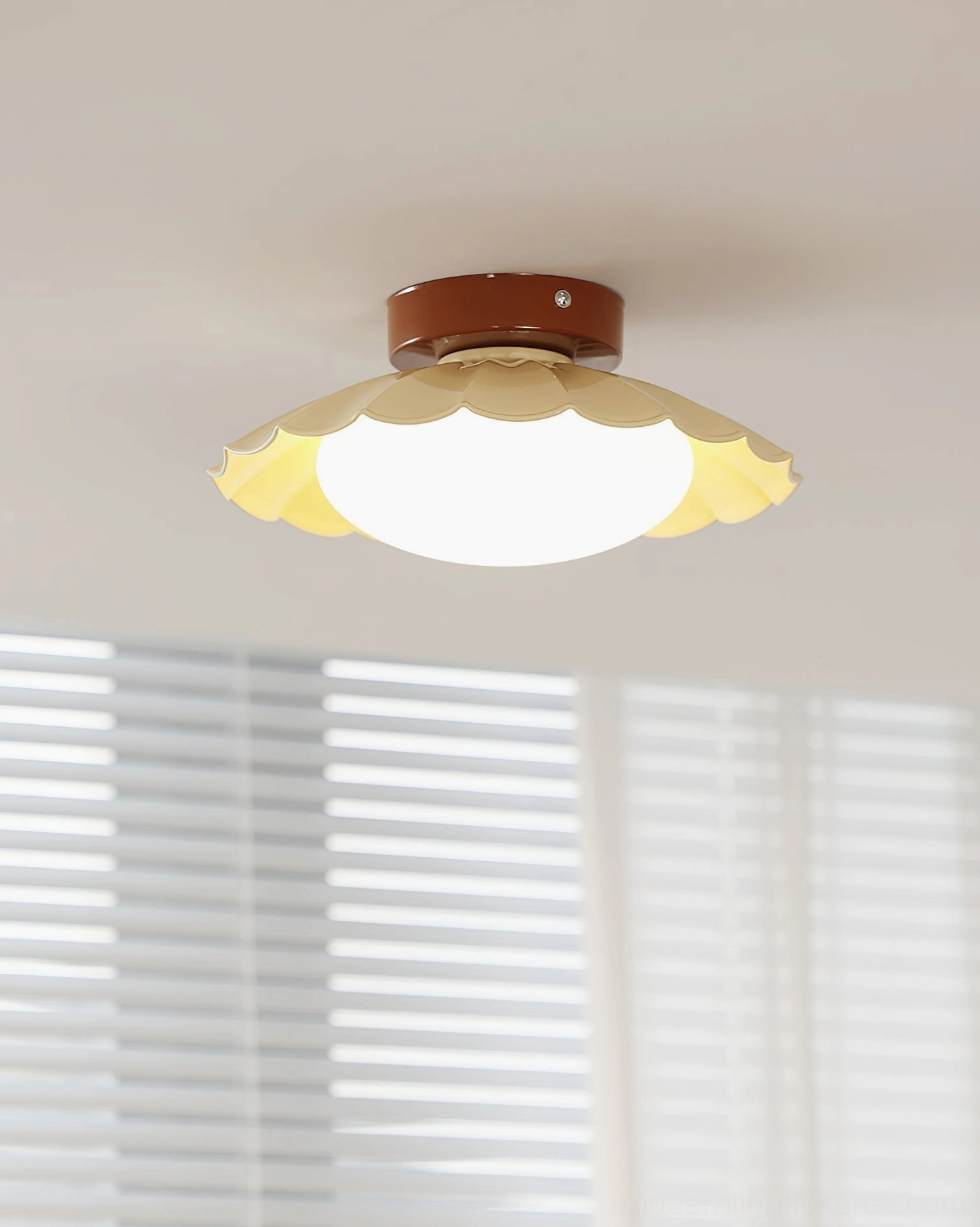 Nephele ceiling light mounted in bright room with window blinds, demonstrating distributed warm 3000K illumination