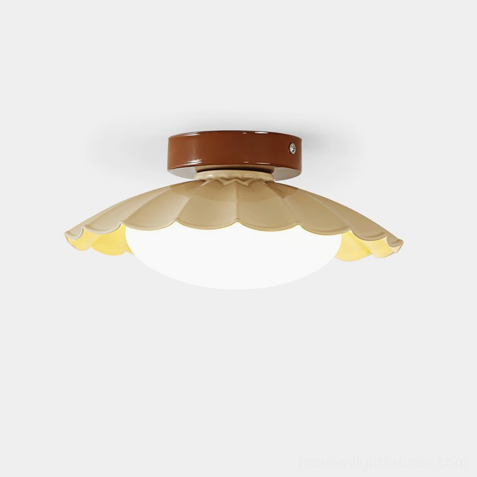 Nephele scalloped cloud-form ceiling light with warm glow, front view showing organic petal design and soft diffusion