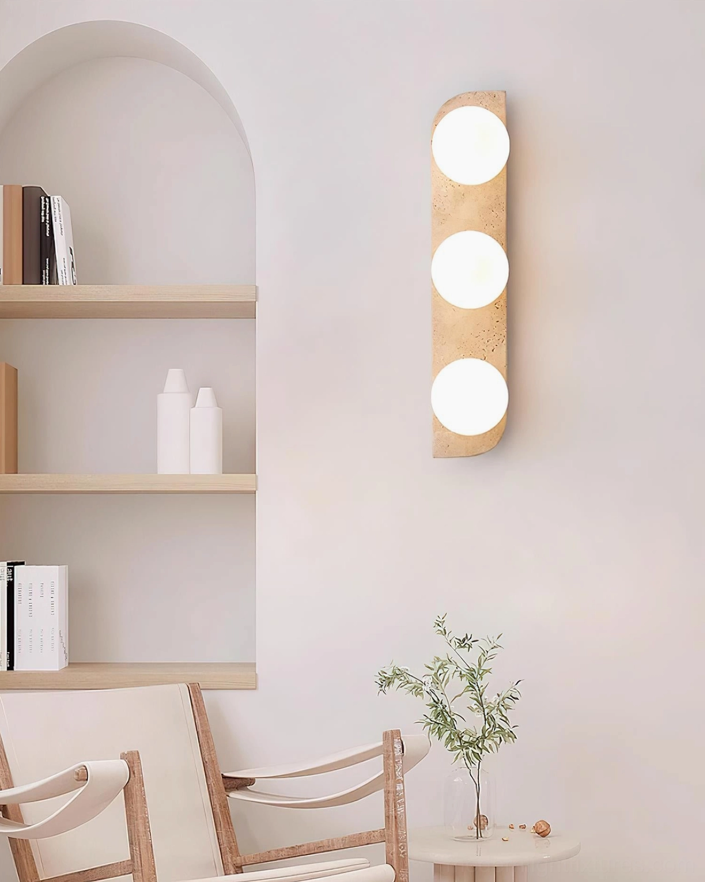 Neptune natural travertine wall sconce showing authentic geological veining and surface character