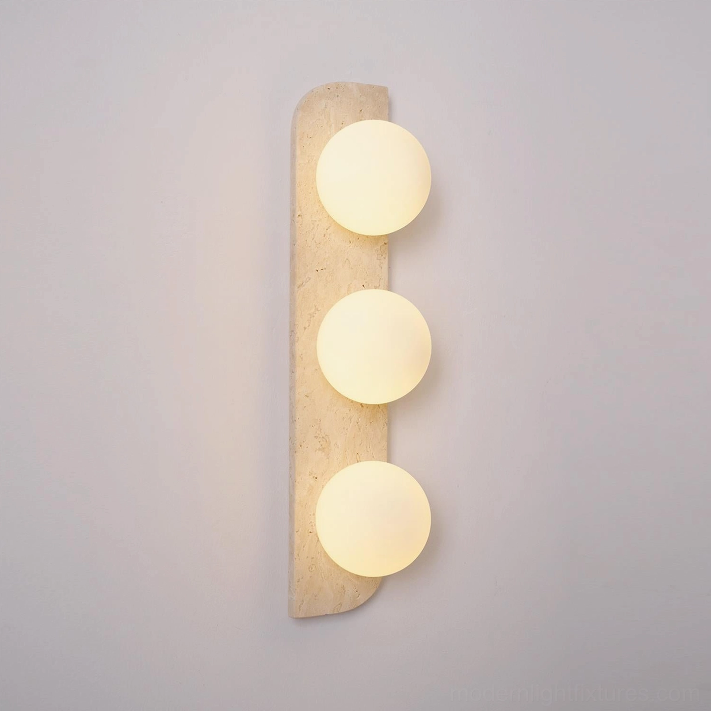 Neptune travertine wall sconce industrial chic raw stone concrete steel design compatibility