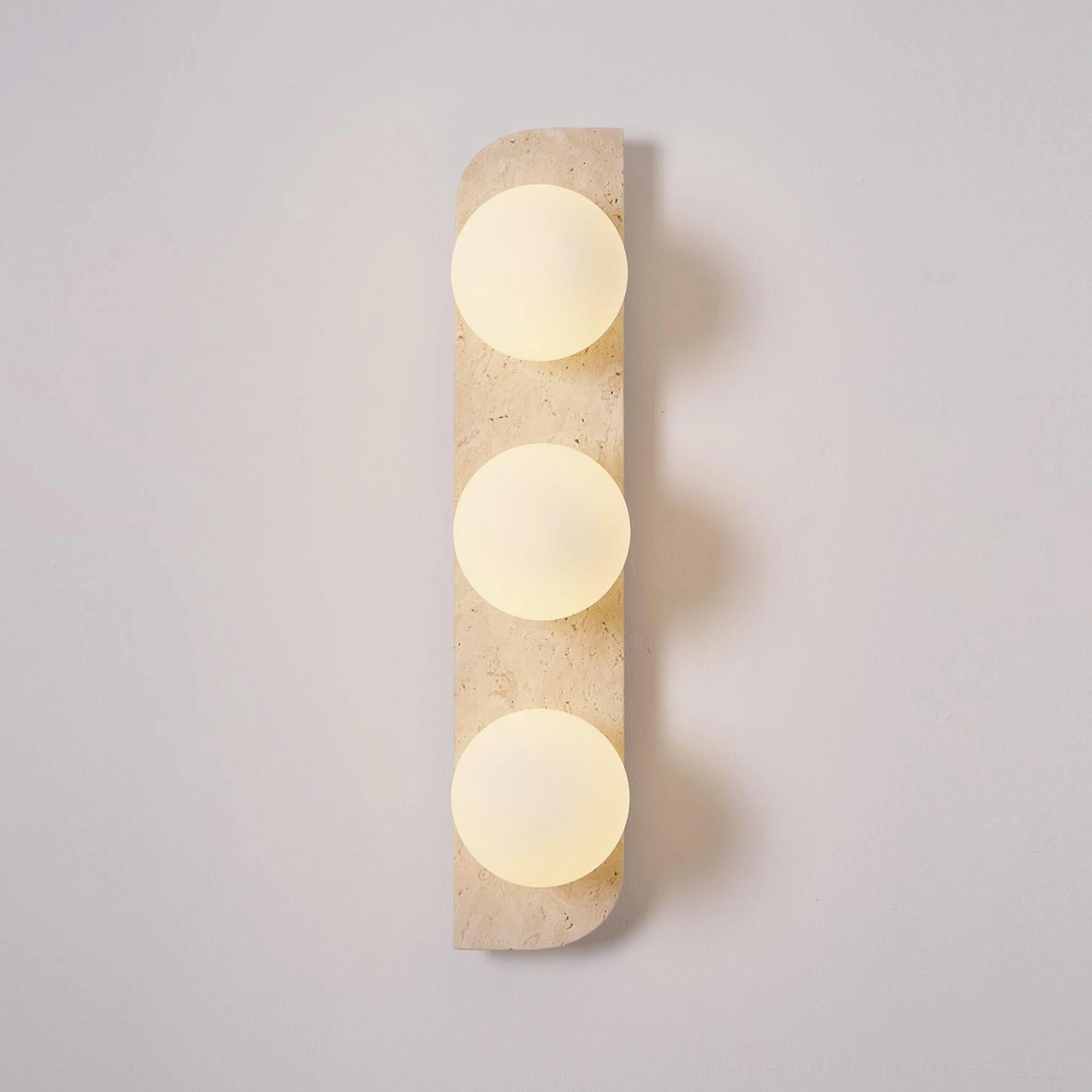 Neptune travertine wall sconce mid-century modern design heritage aesthetic retro contemporary styling