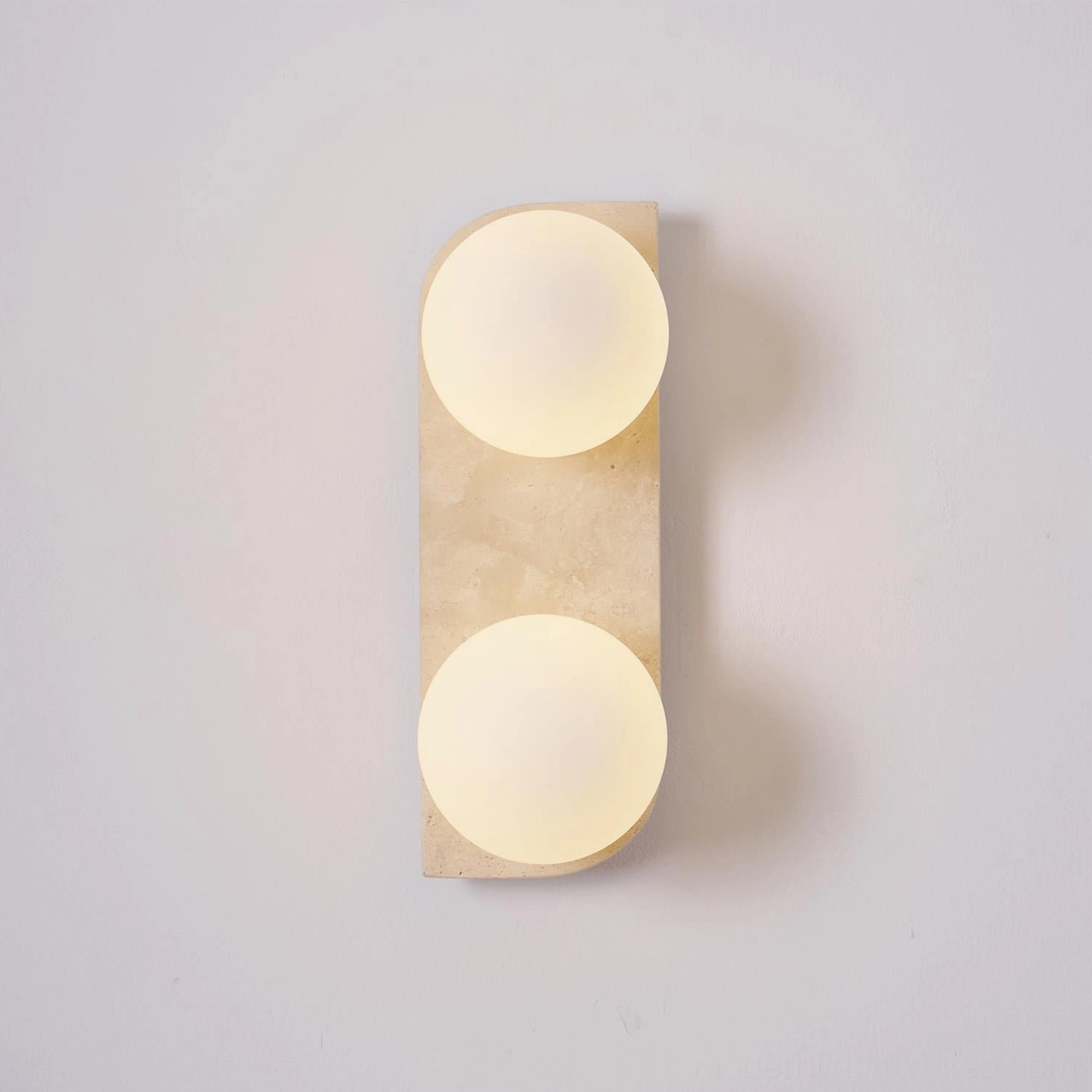 Neptune walnut travertine 3-light wall sconce statement installation warm earth tone finish