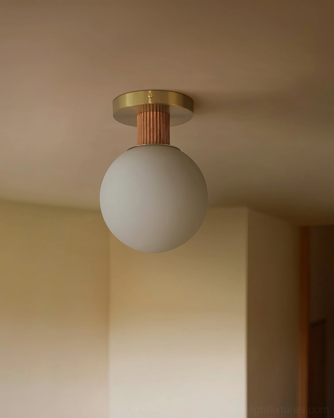 Low-angle view of Neroma frosted glass ceiling lamp in hallway with soft warm ambient light