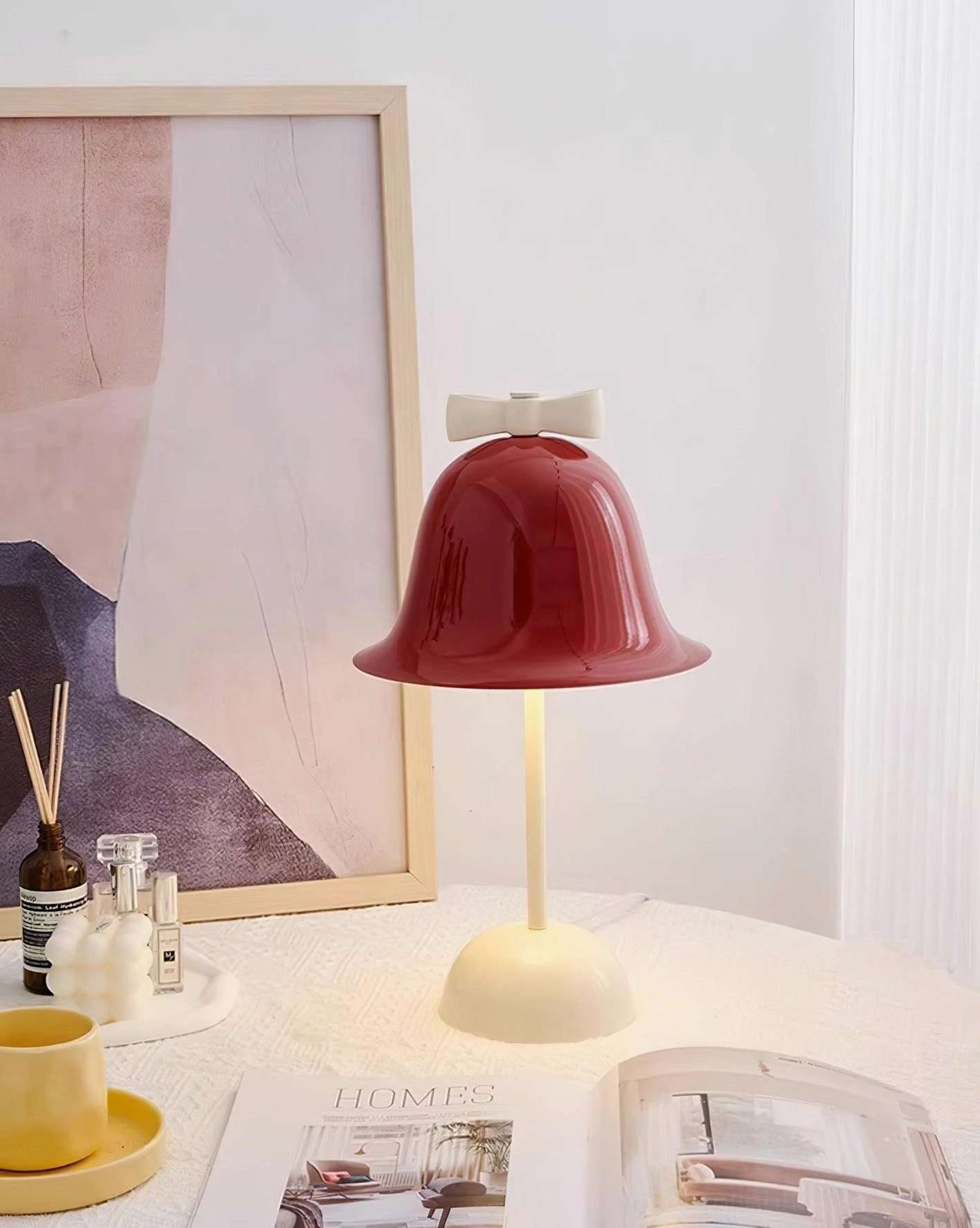 Bow-knot shaped wine red lampshade closeup showing gloss finish and contemporary design