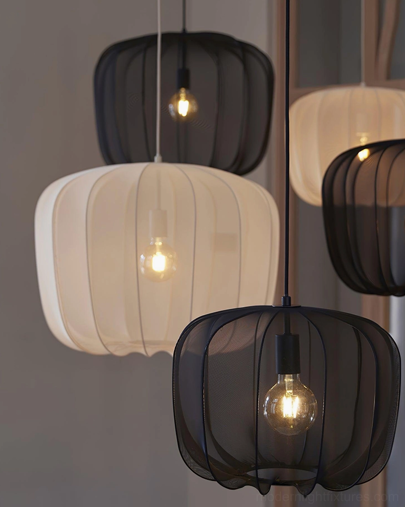 Nevola pendant lamp shade detail close-up, ribbed mesh fabric texture and metal frame construction