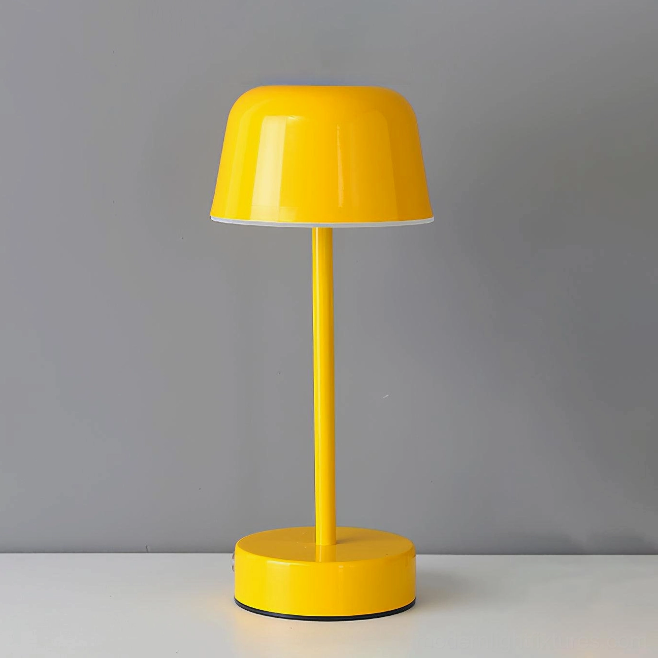 Yellow portable cordless LED table lamp touch activated minimalist modern aesthetic